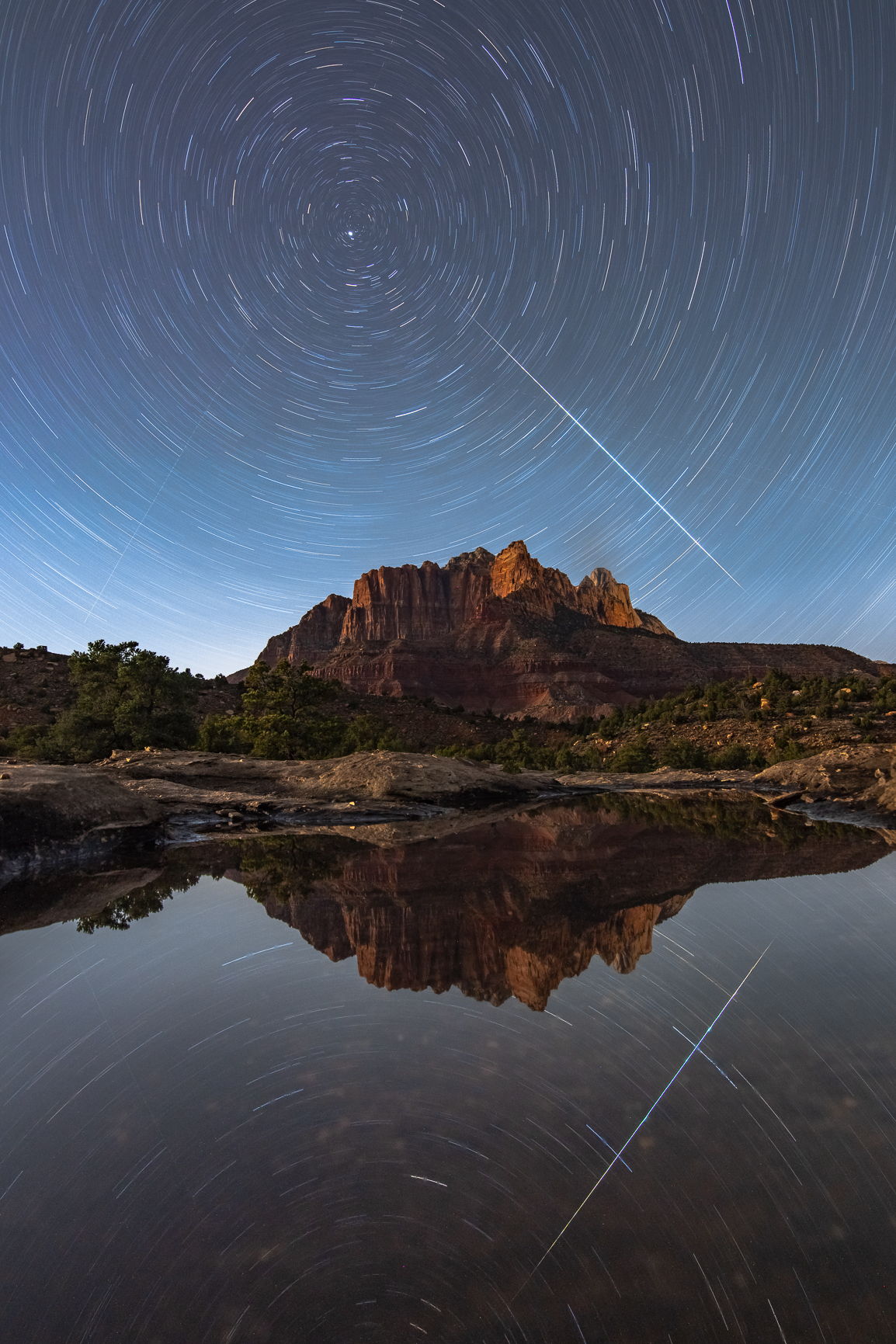 Zion at Night with Stars and Reflection Pool and Shooting Star