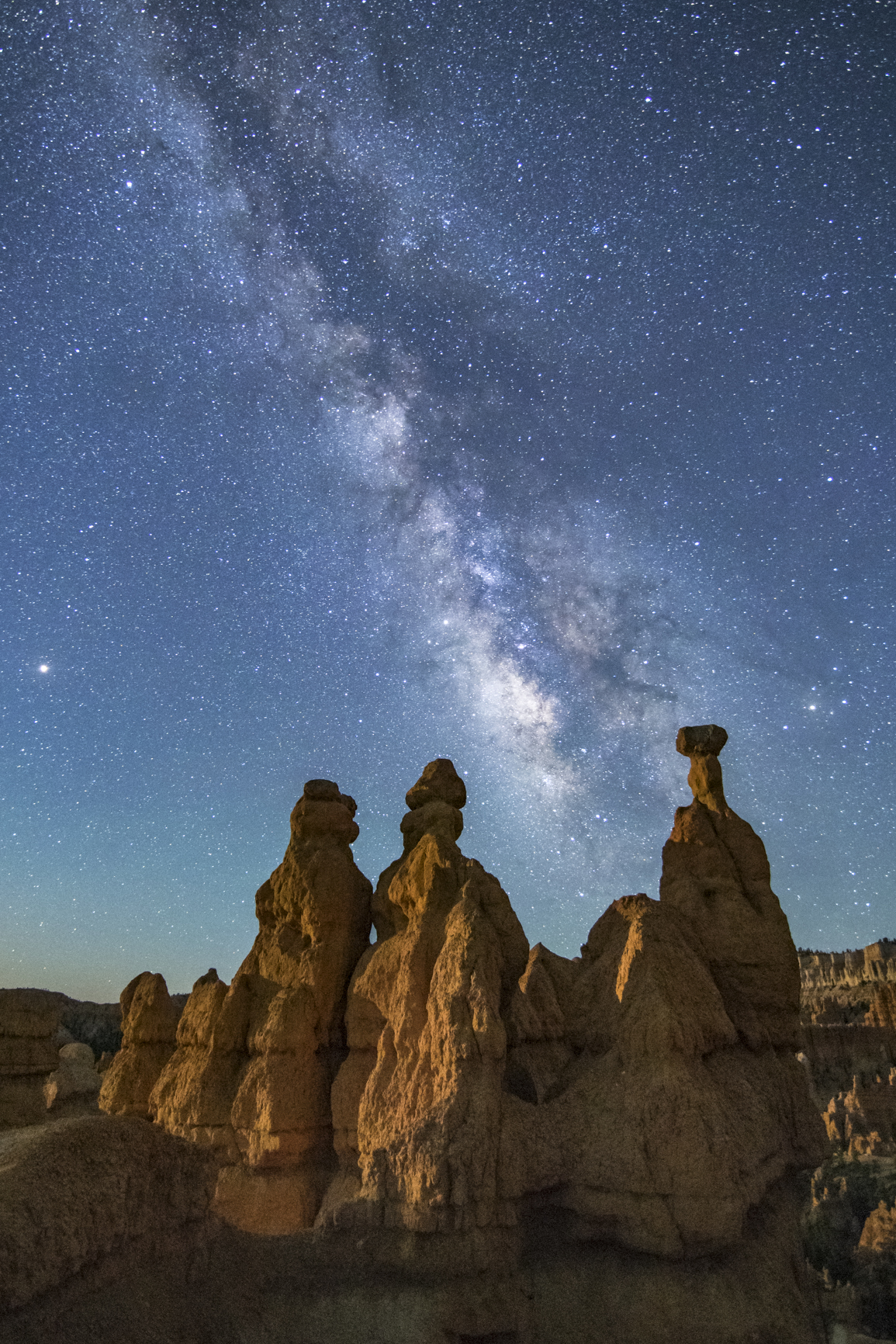 Hoodoo Formations with Moonlight and Milky Way in Bryce