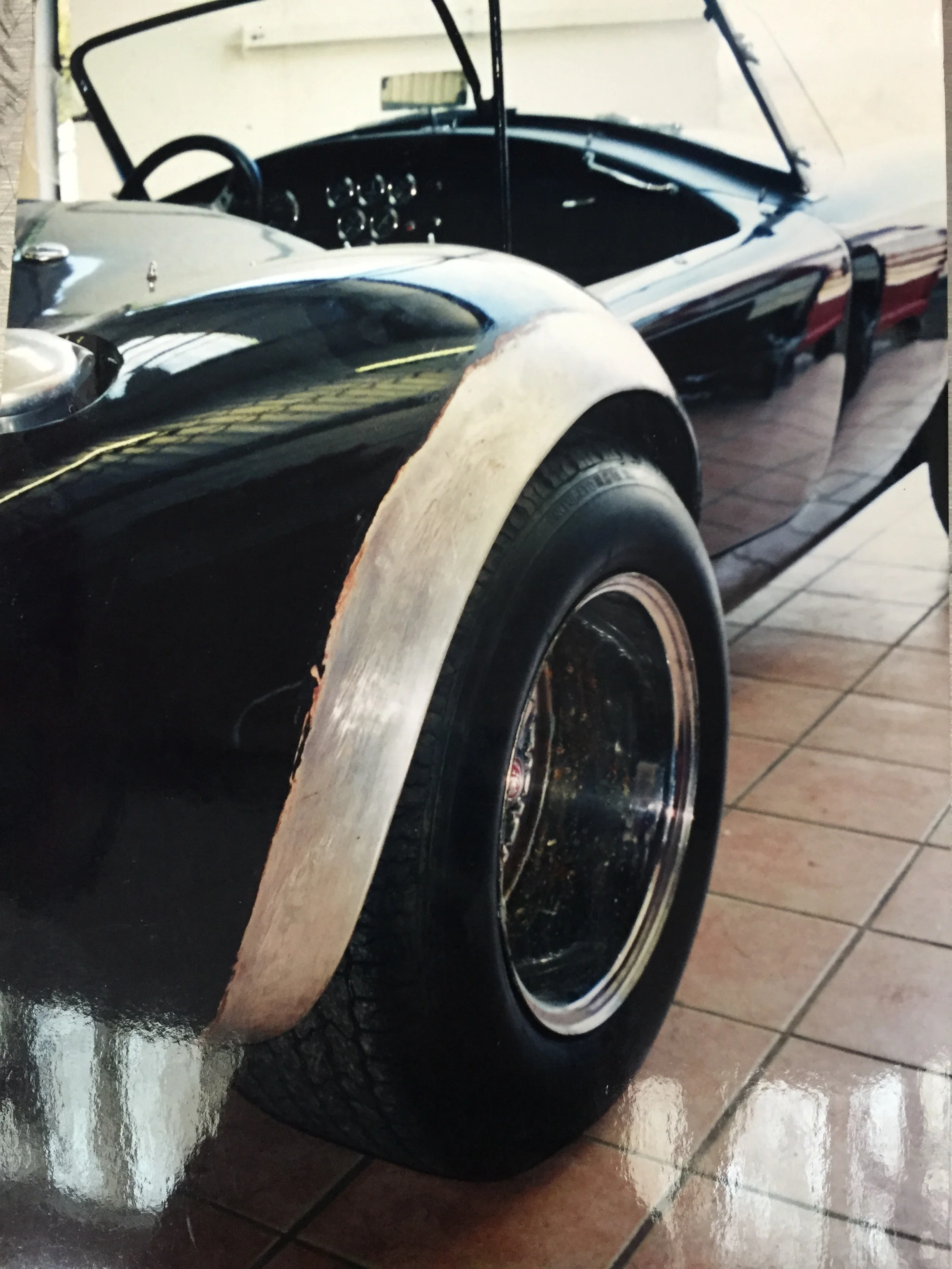 Flared to 427 spec, this original AC Cobra needed to return to stock. Initially, I tried shrinking the wings in situ, but it proved too tricky...