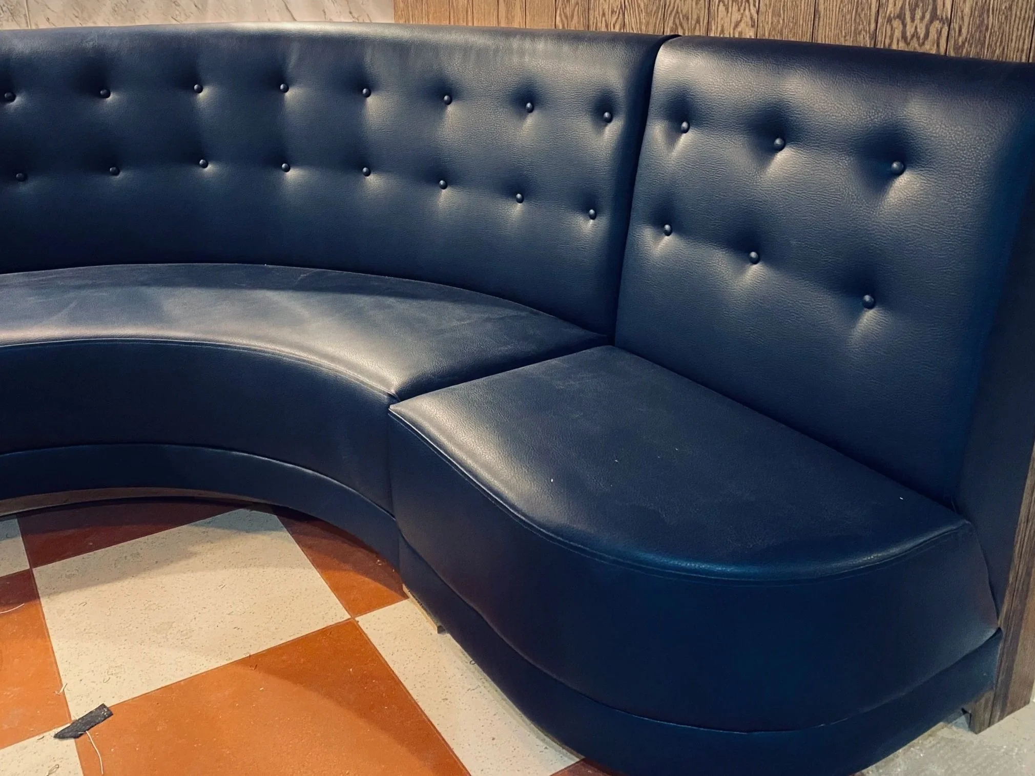 It's all in the details - the buttoned back panels and rounded shape adds an air of sophistication that contrasts with the more 'edgy', casual side of the café.
