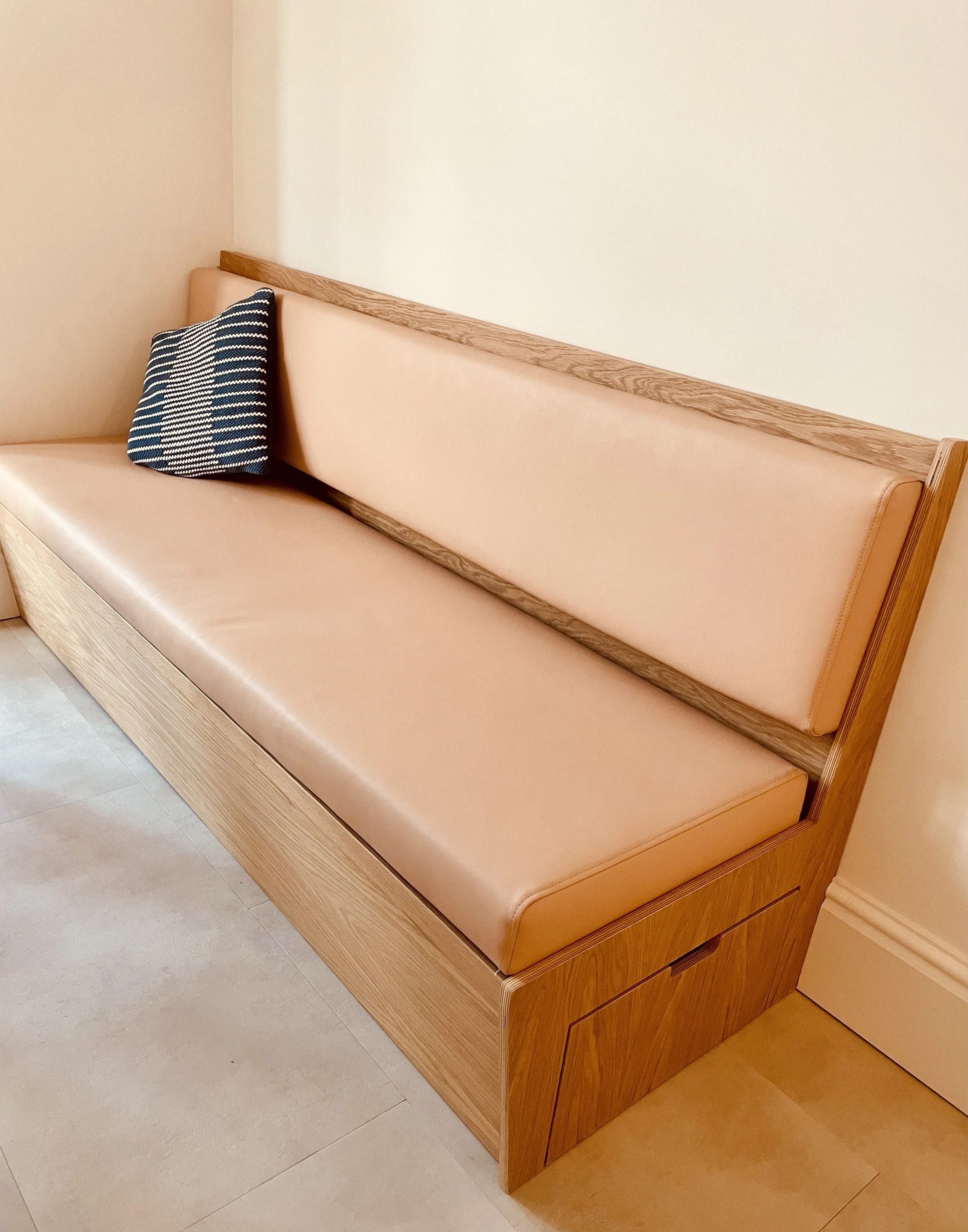 Kitchen banquette for a private client in Chorlton, Manchester.
We worked with pre-drawn designs by our CNC partners - the client wanted a simple dining bench to match the aesthetic of the newly fitted kitchen.
Upholstered in vinyl - a suitable choic