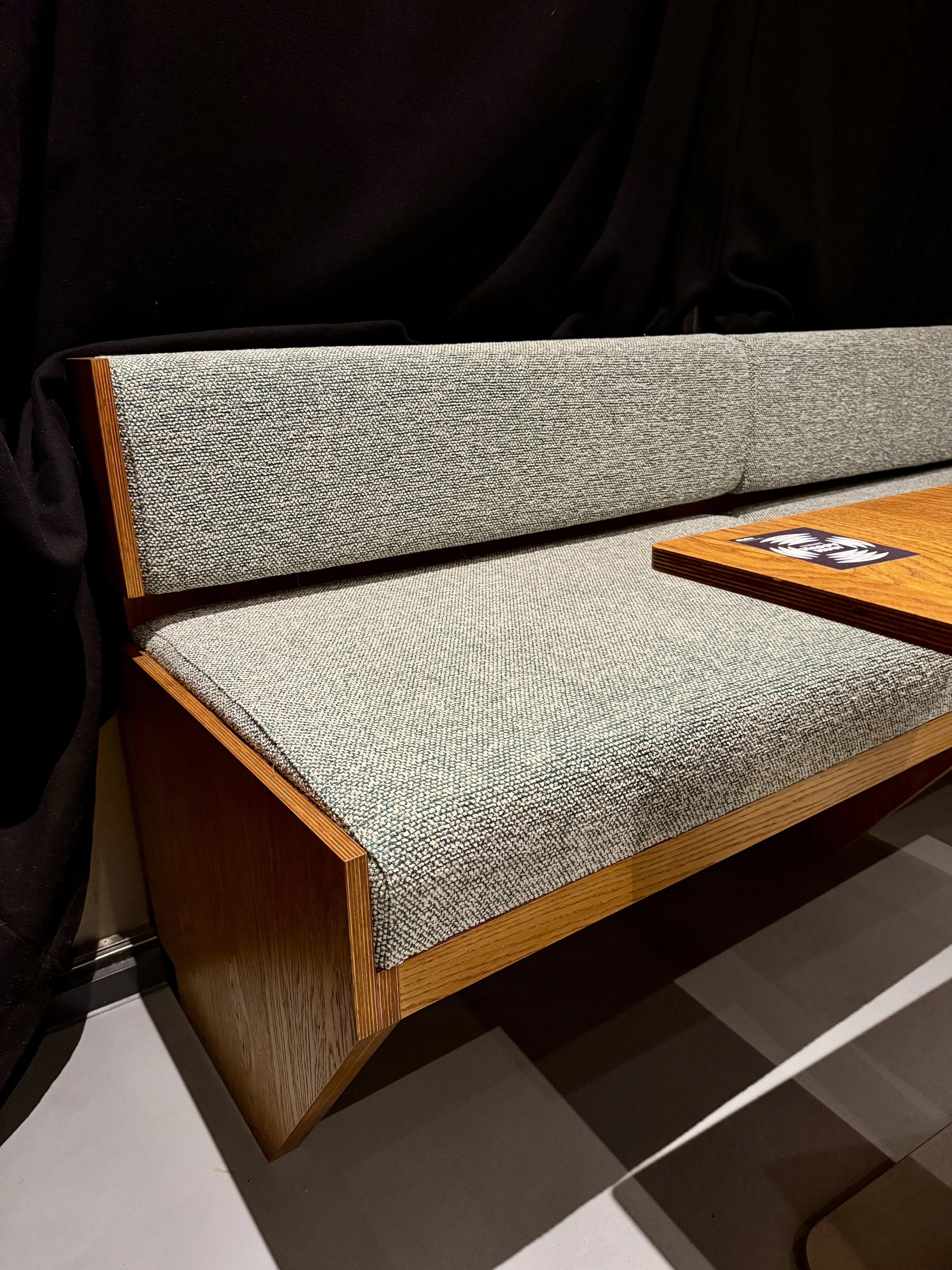 We sourced a fabric to match, with durability and stain resistance as a priority but an alternative to vinyl to add character and a homely vibe. We settled on Moss by Kvadrat - a commercial grade chenille with a twisted yarn, textured finish. Seams t