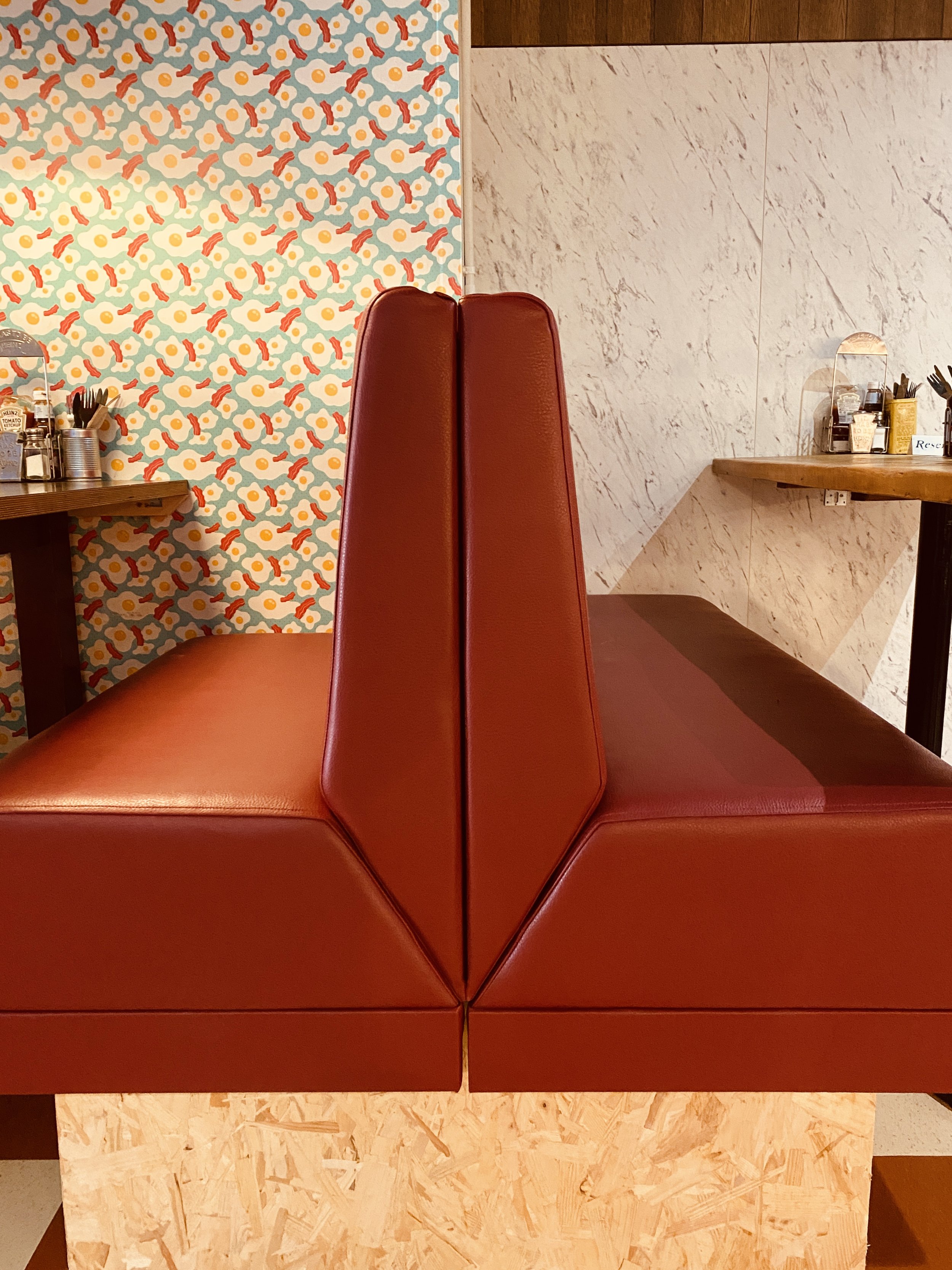 For the red zone, we collaborated with designer Rob to create an American diner feel with an edge… Working with our CNC partner, the seats were constructed to create a distinctive chevron shape. For an open-all-hours café wear and tear will be inevit