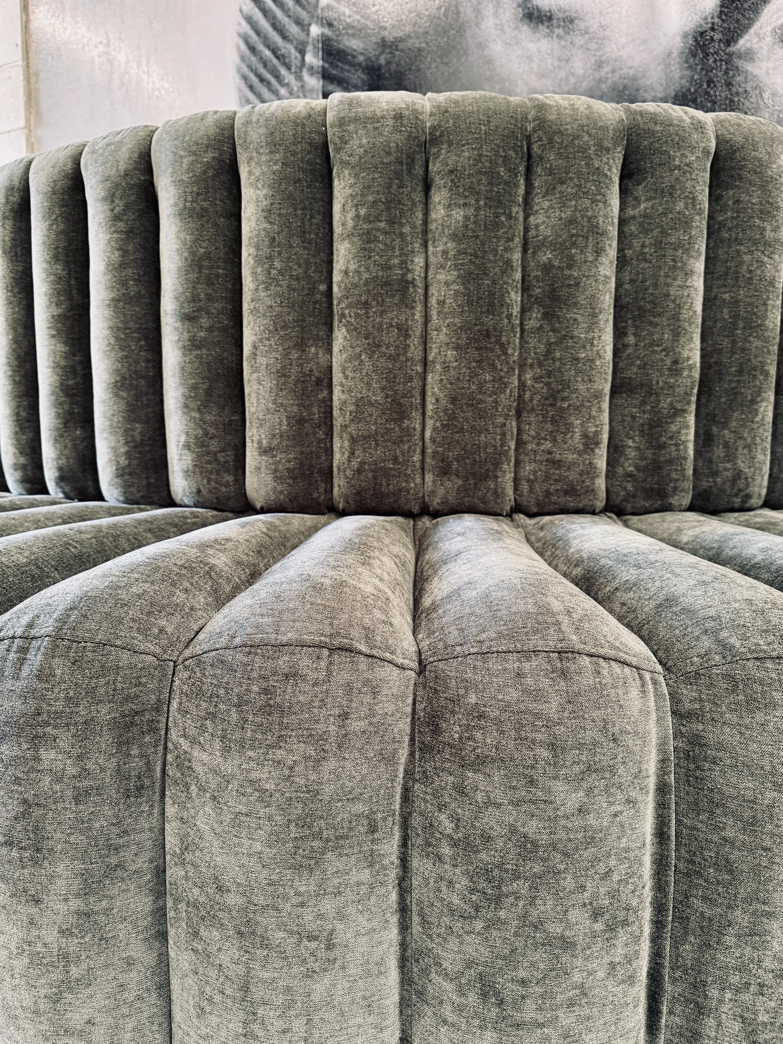 Upholstered in a commercial grade chenille fabric for durability with a slightly distressed look.