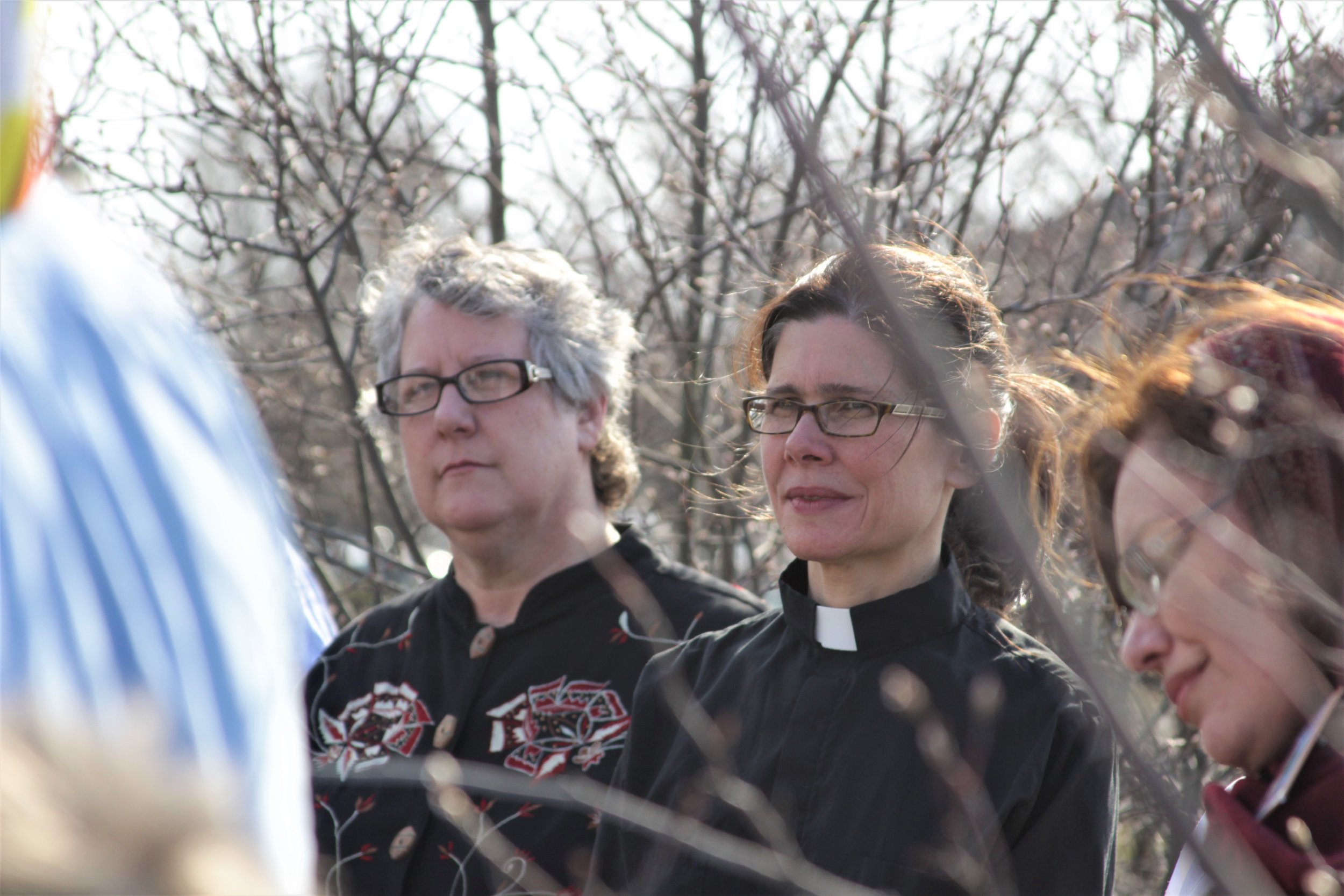  Julie Taylor, Executive Director of Wendy's Boycott endorser National Farm Worker Ministry (LEFT),&nbsp;listens to fellow leaders after sharing inspiring words with the fasters and allies alongside longtime supporter Rev. Noelle Damico 