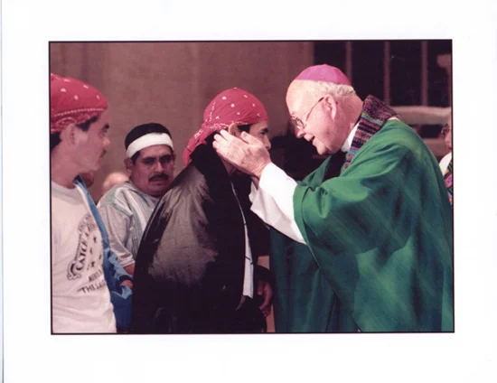 CIW hunger strikers receive communion from the late Bishop John Nevins in January of 1988 in a ceremony breaking their historic month-long fast in Naples, FL.
