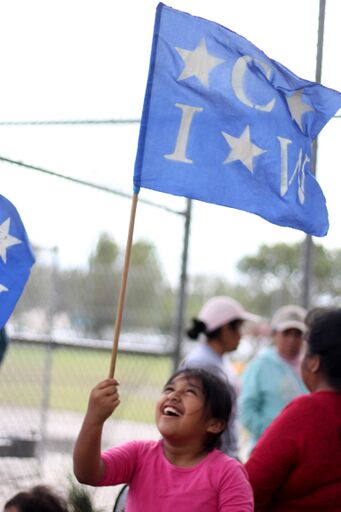 CIW flag child laughing.jpeg