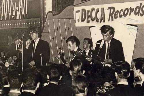 Eddlie Levine and the Escorts at the Mecca Ballroom in Grimsby 1963 - L to R: bassist Mars Cowling, singer Eddie Levine, lead guitarist "Memphis," drummer Geoff Knight, and "Migs" on second lead guitar.