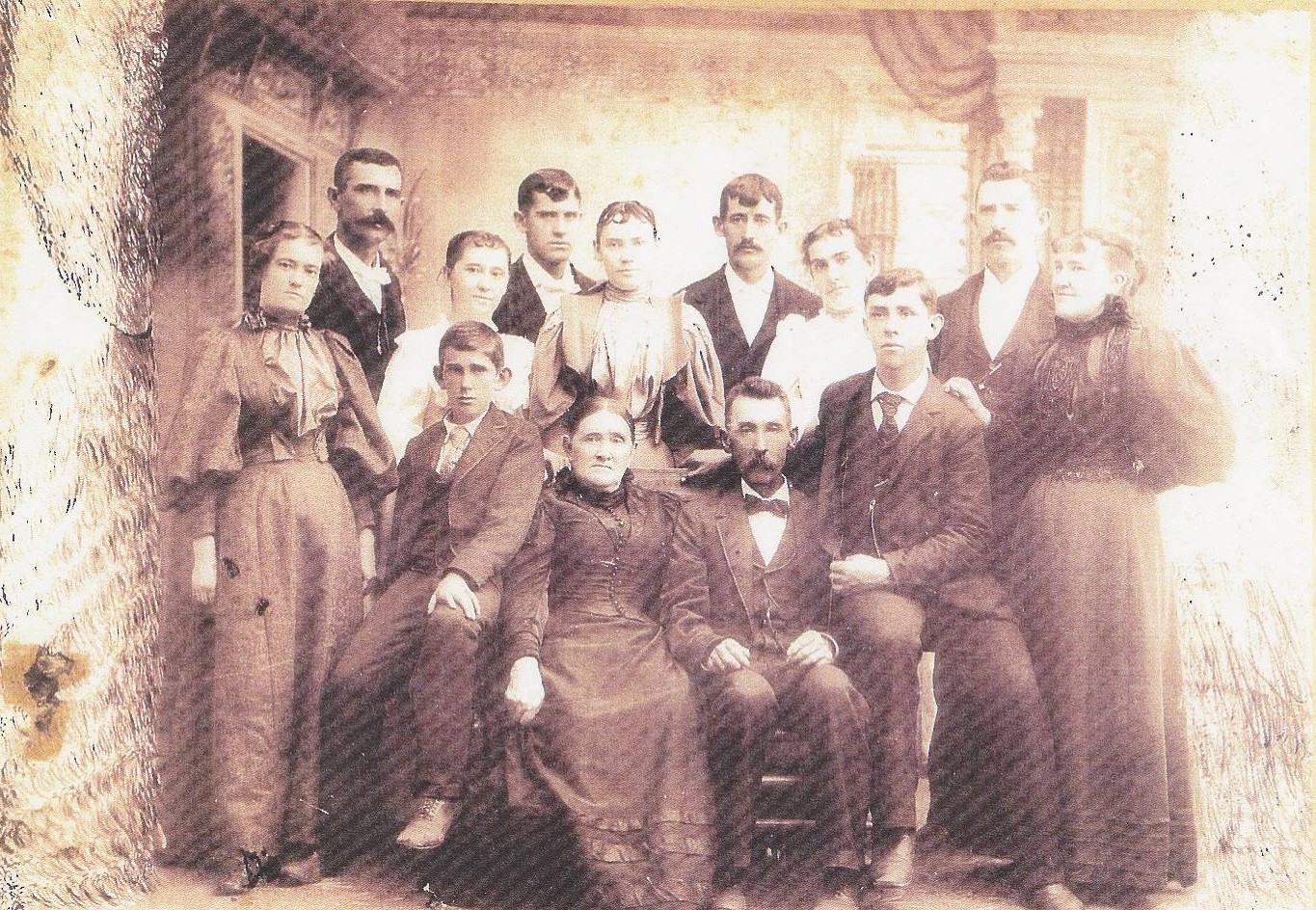 A fun-looking bunch of Kellys, with our great-great Grandfather John, with his wife Catherine on the far left. 
