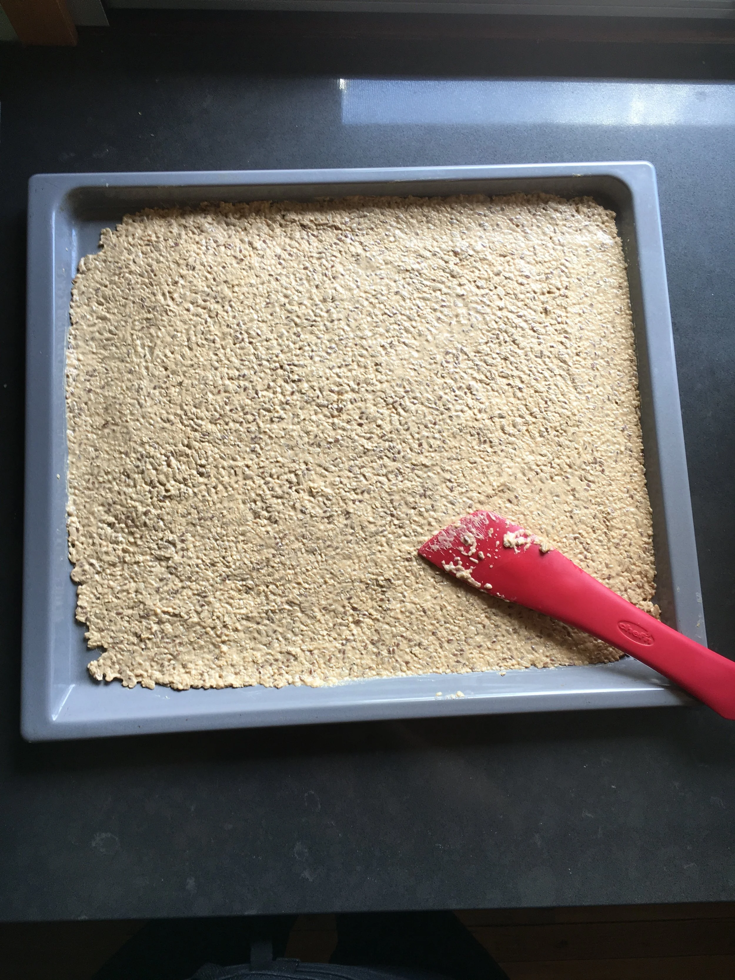 Spread out as thin as possible, ready to bake