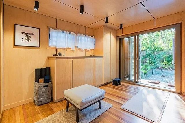 When you work and live within a limited space, you have to create areas to fulfil your personal lifestyle needs. 
The easiest way is to have multi use rooms. This space used to be the main bedroom is now a dressing room and Yoga/Pilates space. 
Built