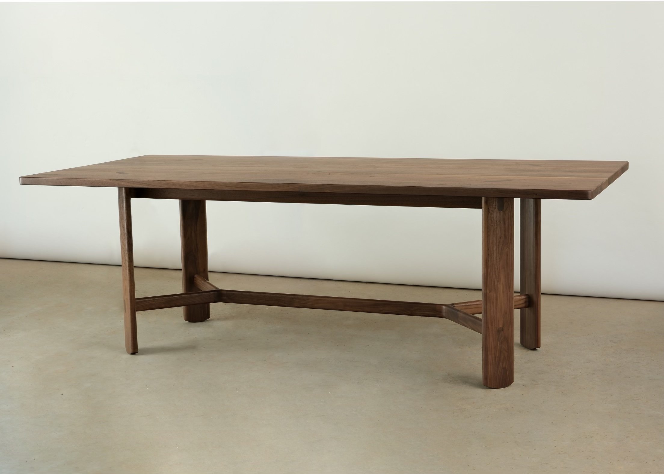 ghent dining table walnut wide view.jpg