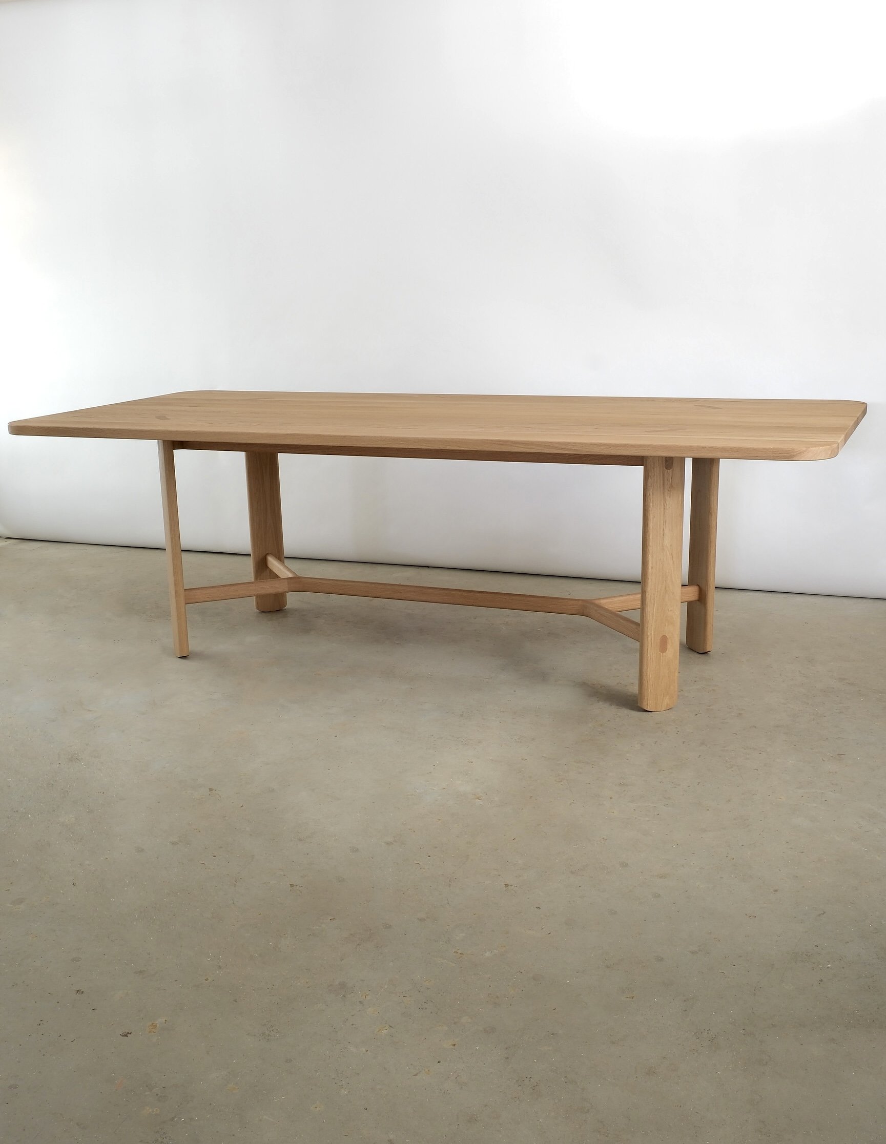 ghent dining table in oak wide view.jpg