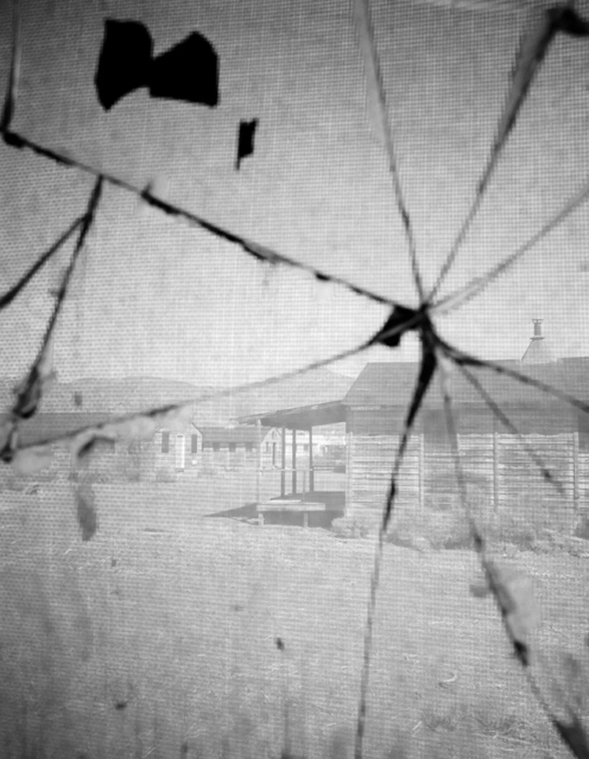 View through cracked glass, enlisted men's' barracks