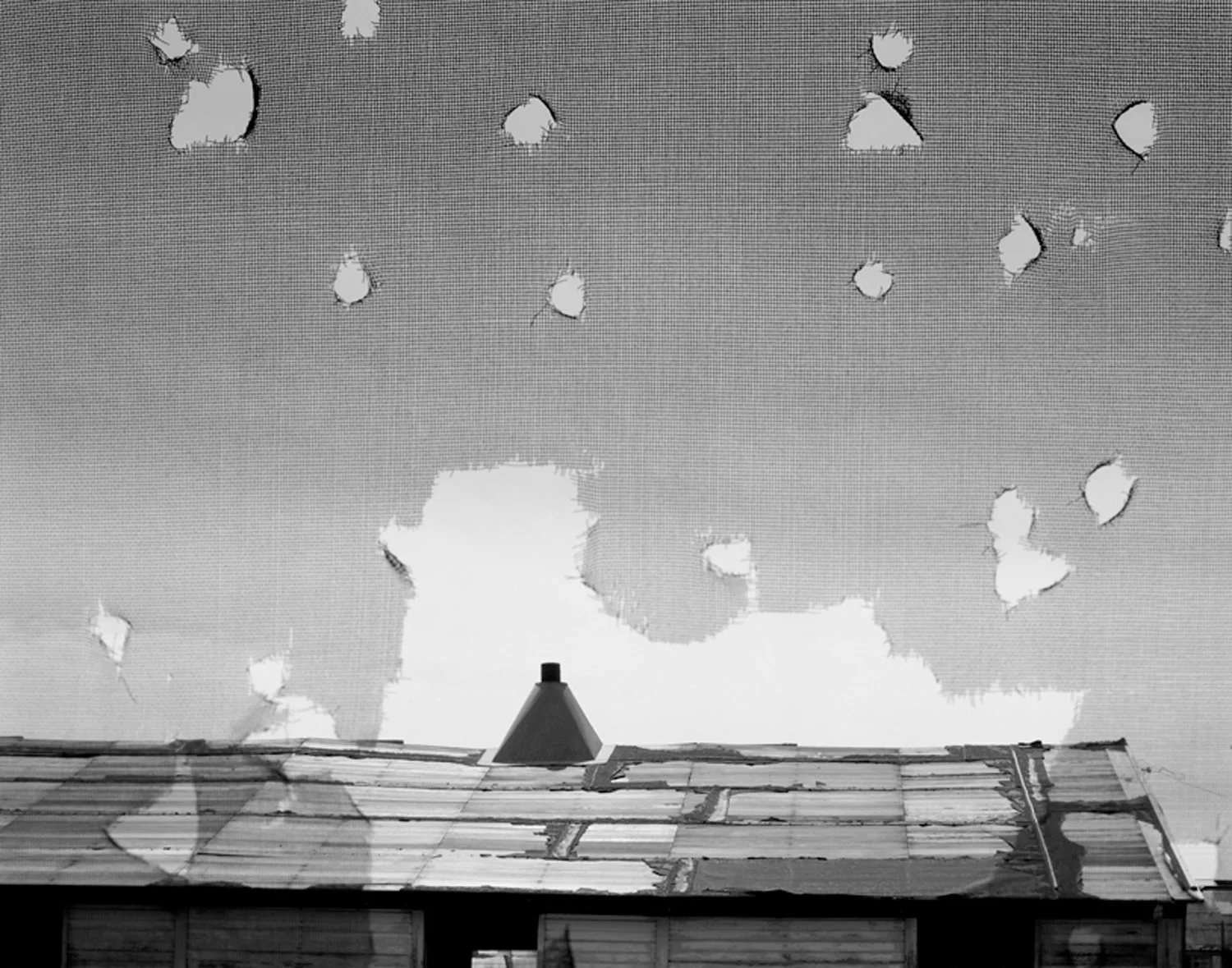 Holes torn in window screen, airmen's barracks