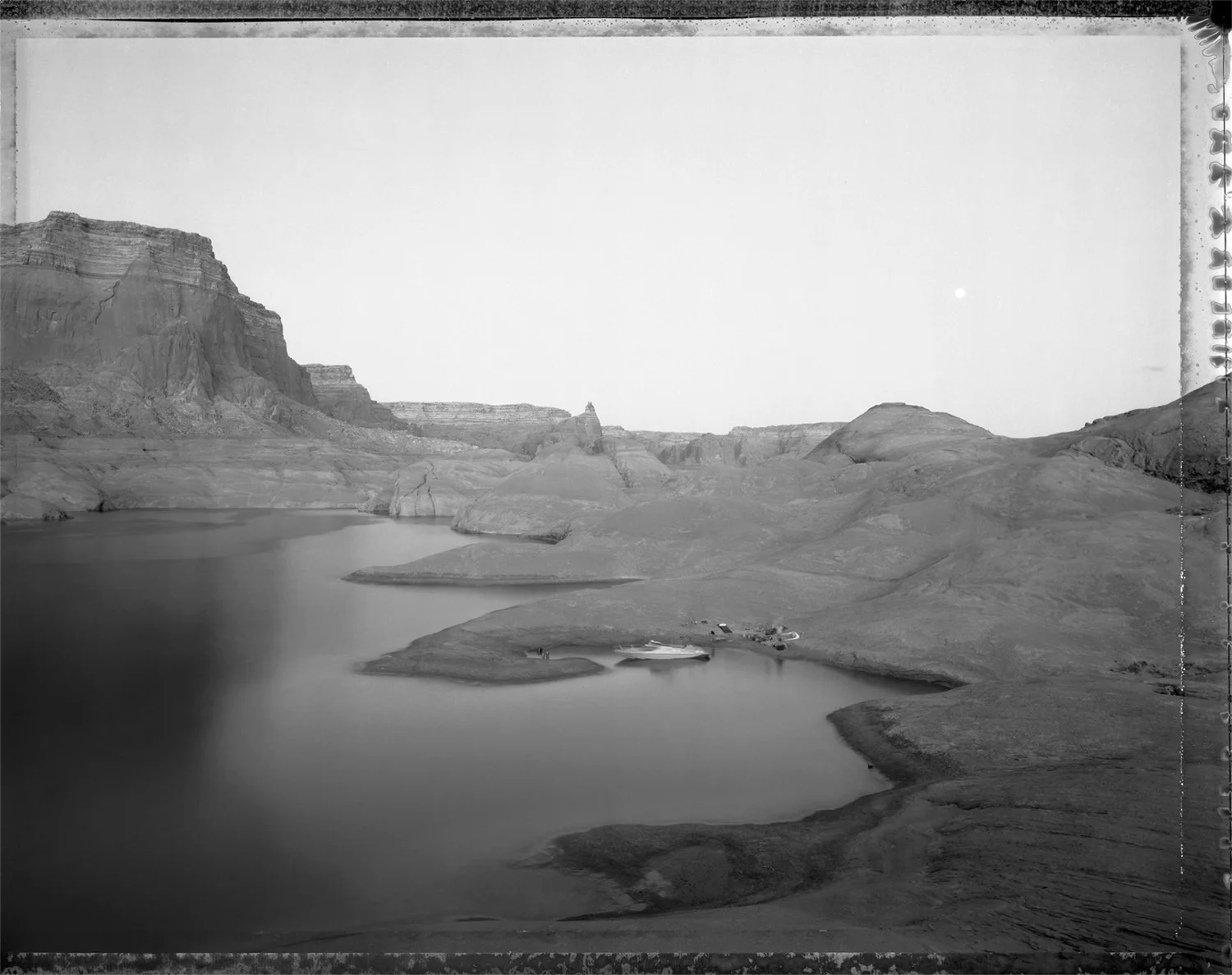 Campsite reached by boat through watery canyons, Lake Powell, 1983