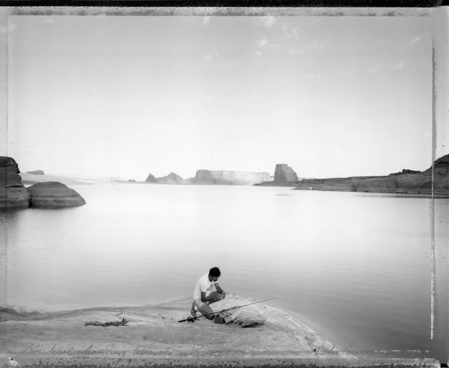 Michael changing lures to no avail, Lake Powell, 1984