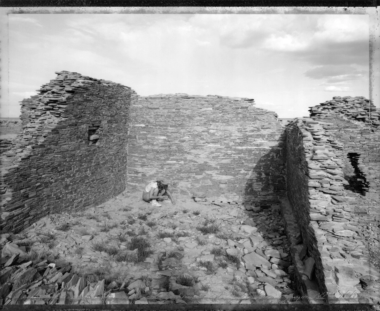 Searching for artifacts, unexcavated ruins, Chaco Canyon, New Mexico, 1982