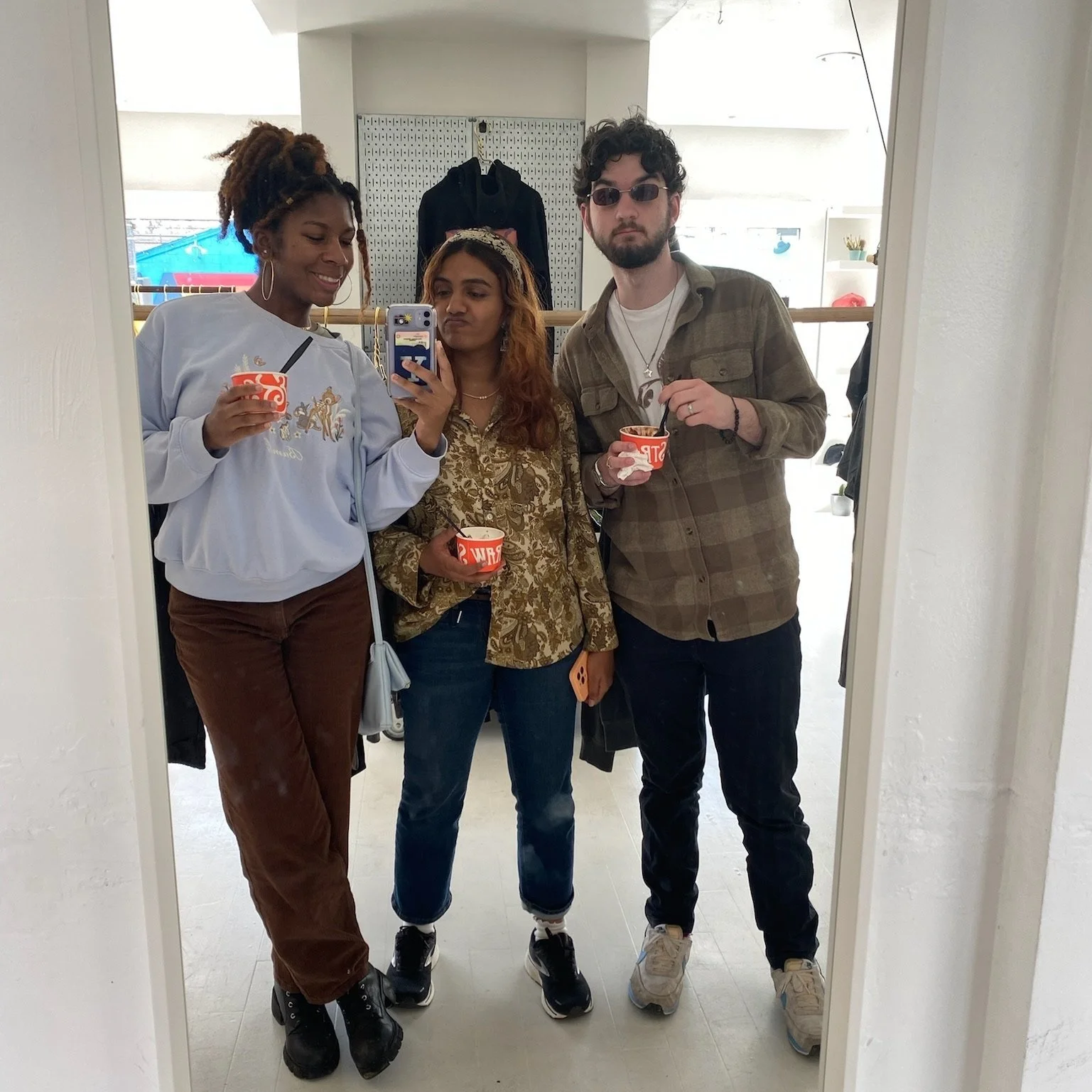  (Left to right) Misan, Rishika, and Will inside a shop in blank eating Salt &amp; Straw icecream (try the honey lavender!) 