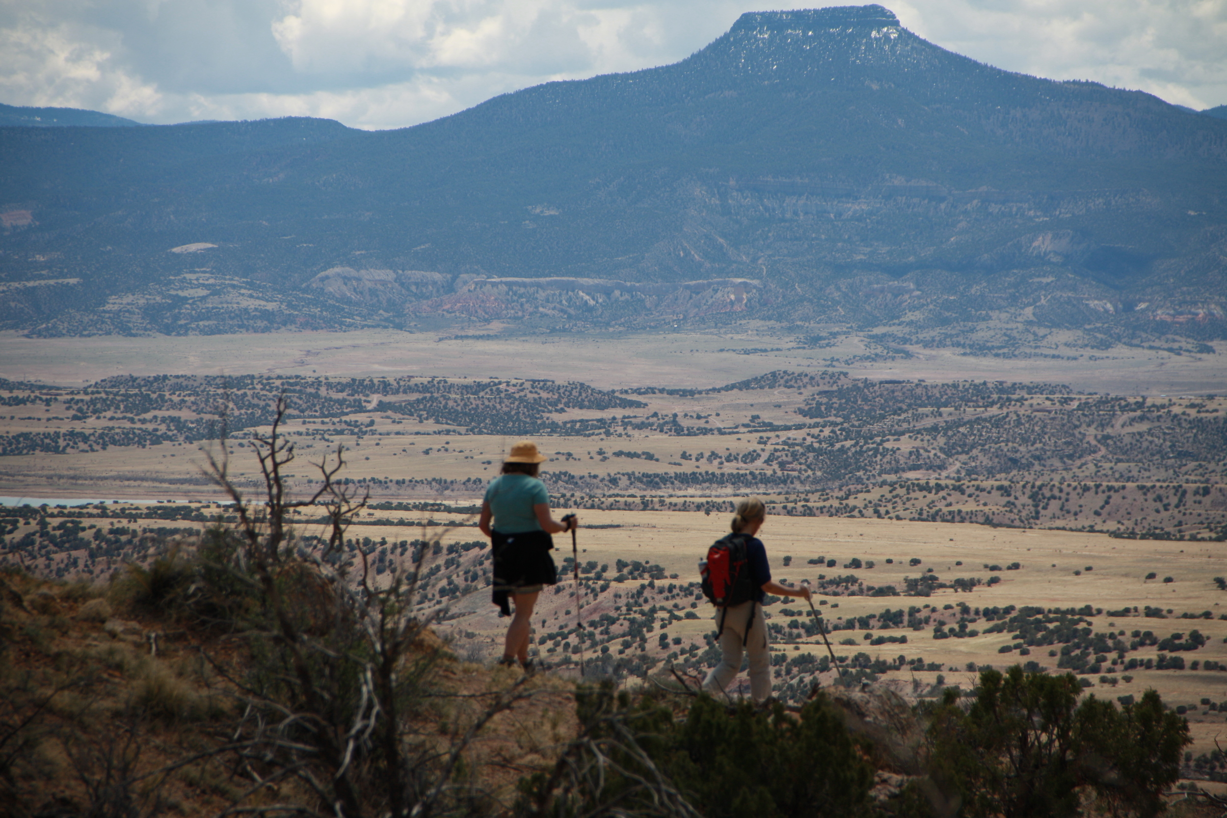 The Chama valley stretches below Margaret and Molly, with the snowy heights of Pedernal watching over. 