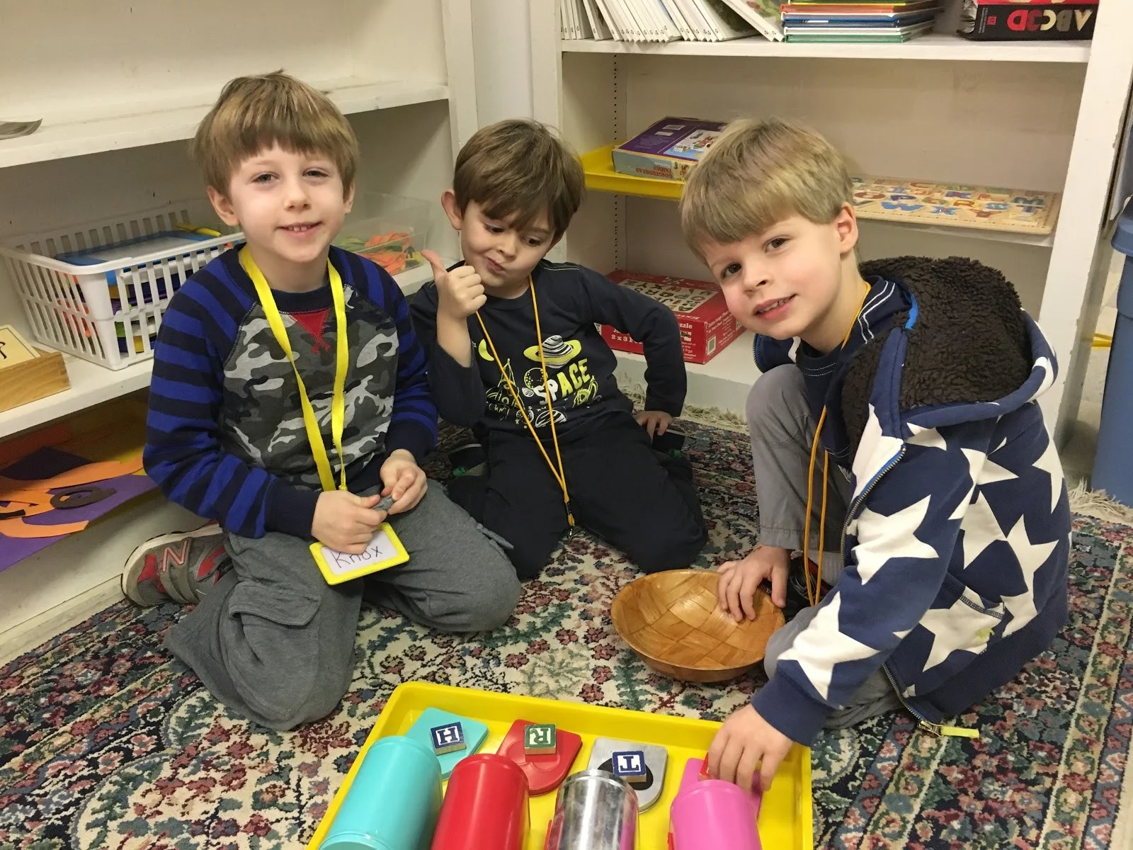 The children are also delivering “lost” objects to the mailbox labeled with its beginning sound.