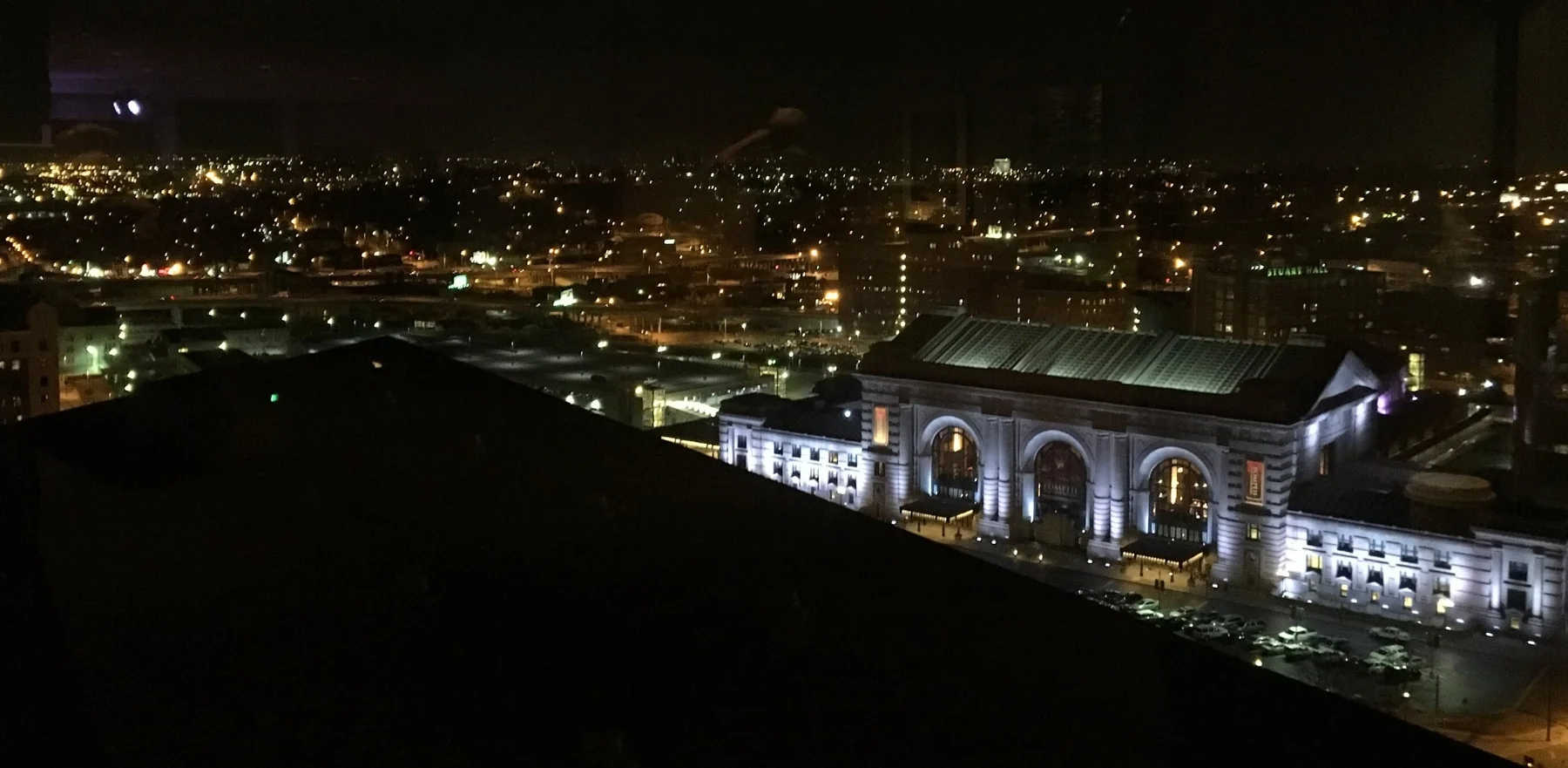 The view from Benton's private suite. Beautiful showcase room, 360 view of Kansas City downtown. That's Union Station all lit up in blue. 