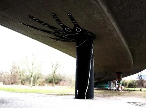 Hand holding up bridge.jpg