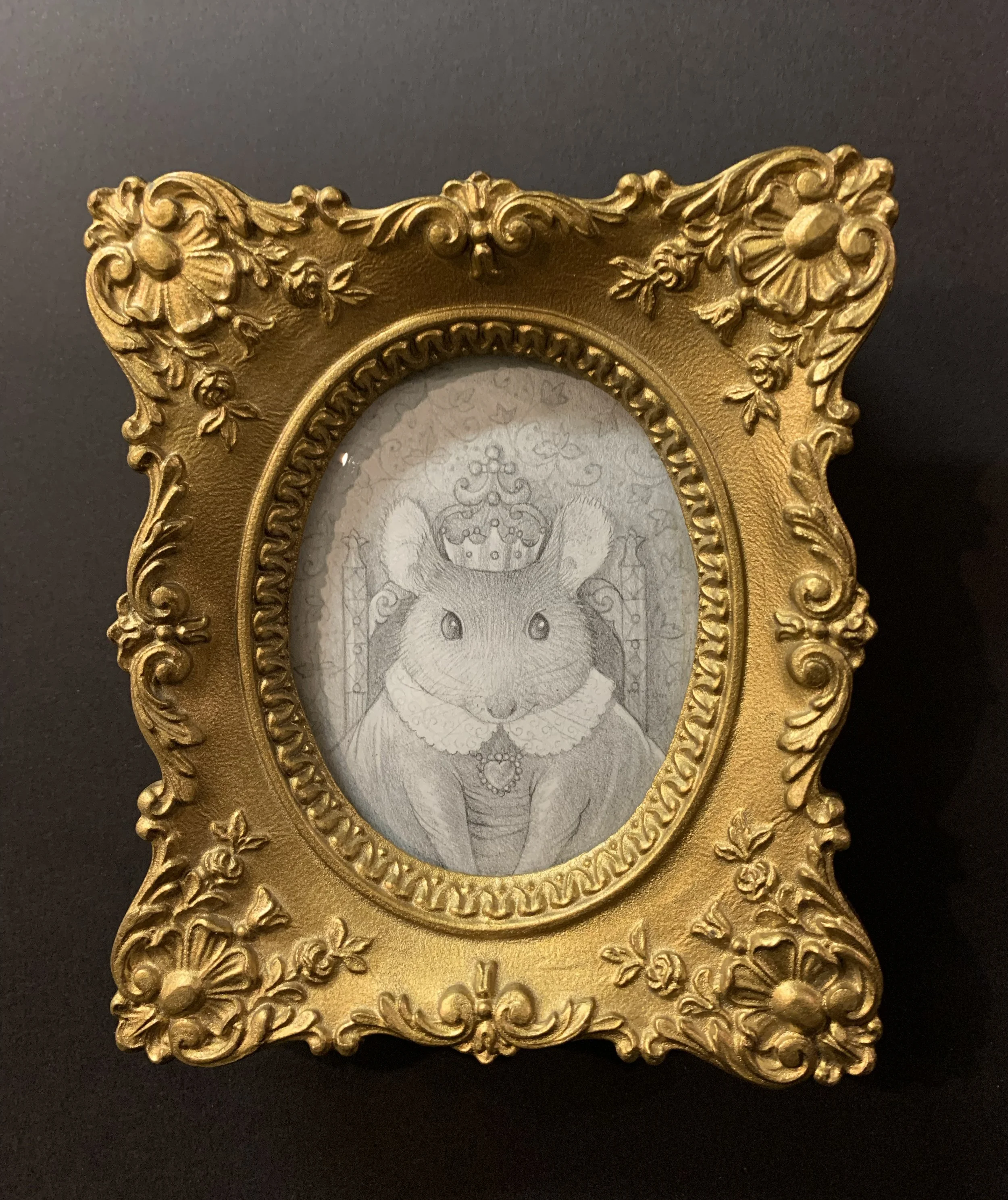  "Queen Alice"   Graphite on Paper, 3"x2.5"   Framed: 5"x4.5"  Her Majesty is keen on governing with grace and kindness, providing an abundance of cheese and crackers for everymouse.  Available  here . 