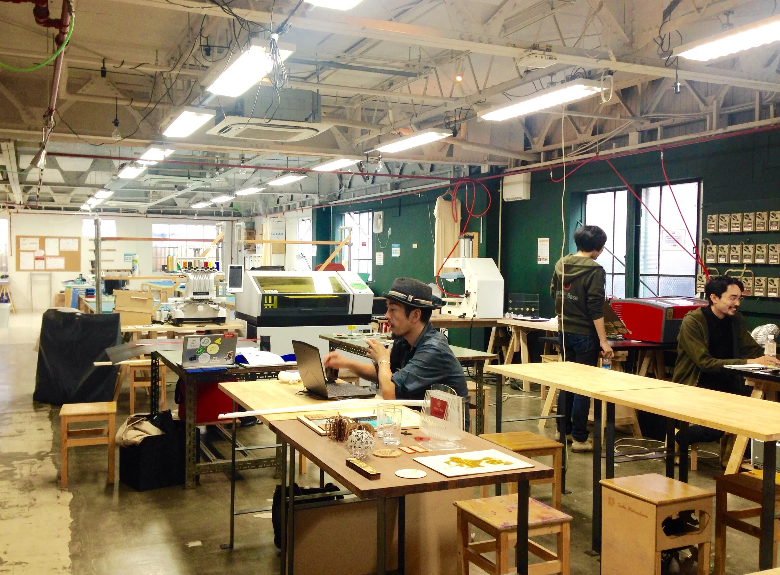Digital workspace equipped with laser, UV printers and leather sewing machines