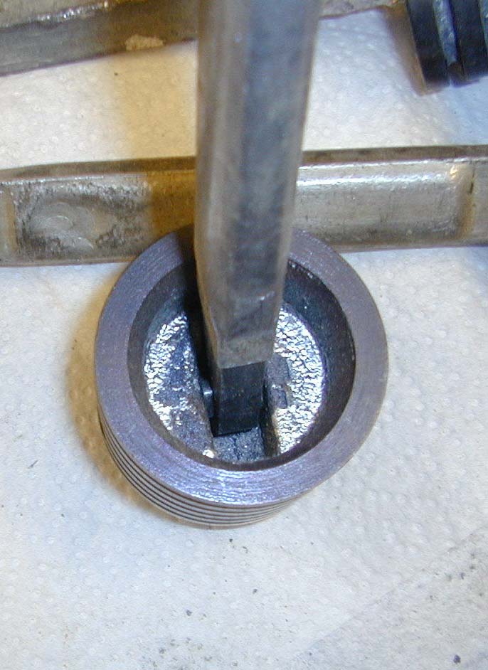 Looking down on plunger as it would sit in well.