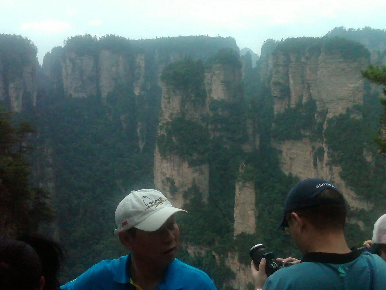 We just spent three days climbing the mountains of Zhang Jia Jie- the inspiration for the setting of Avatar. When the fog rolls in and the countless stone peaks each peek above the mist, the setting is magical. That is, if you can overlook the milli…