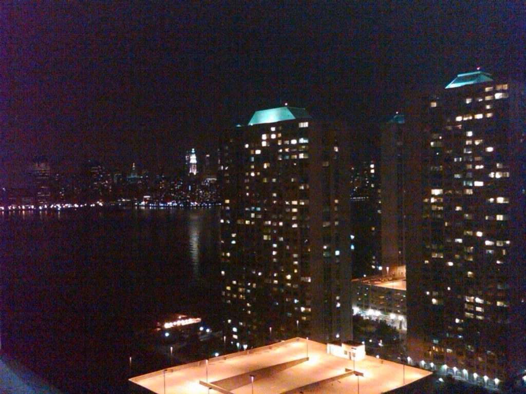 My first mobile Tumblr post. a bbry shot of the view from our balcony on the water in NJ last night. say what you want about New Jersey but I’m enjoying lobster crab cakes and steak over a view of the NY skyline, the soft summer breeze and my …