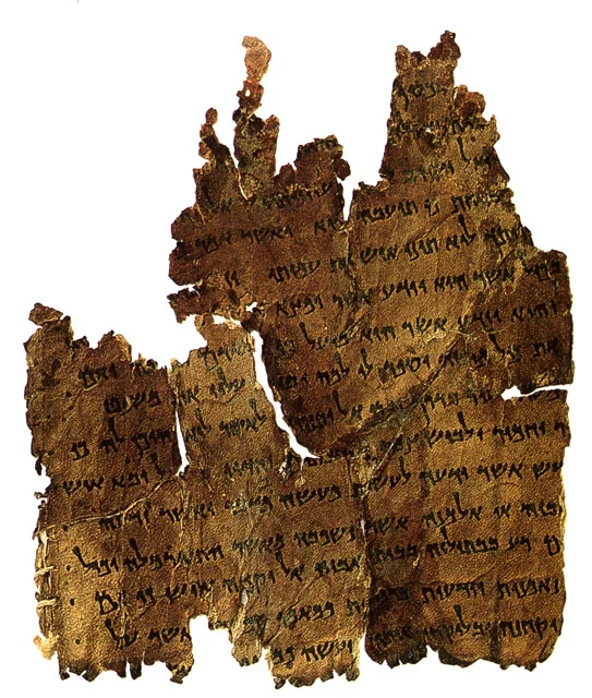 The Multiple Faces and Phases of Texts at Qumran: Growth, Expansion, and Rewriting in Community Documents