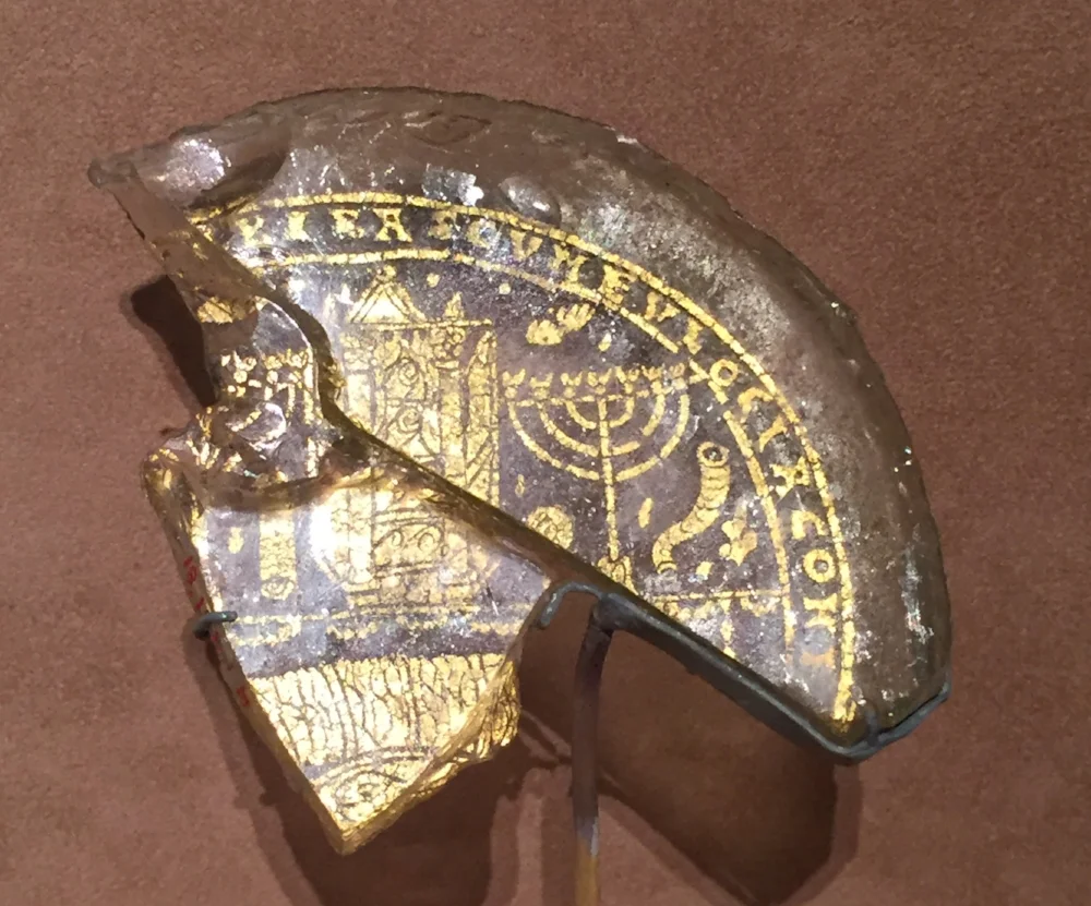 Gold leaf and glass bowl base, with Menorah, Shofar, and Torah Ark | Roman, ca. 300-350, currently on display in the Metropolitan Museum , New York.