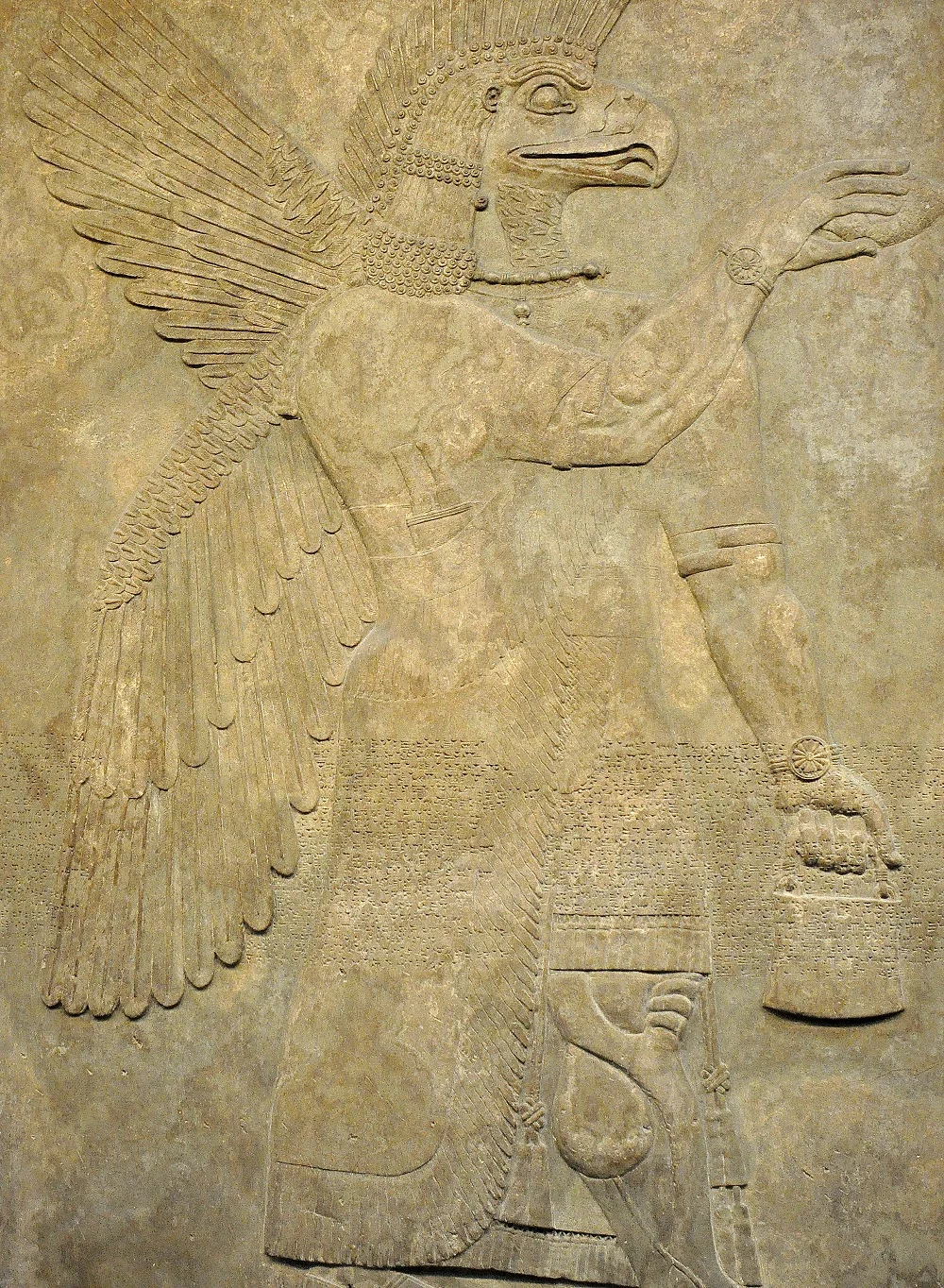 Neo-Assyrian wall relief depicting an eagle-headed apkallu (sage) | In the British Museum, from the Palace of Ashunasirpal II at Nimrud, Iraq | Image source