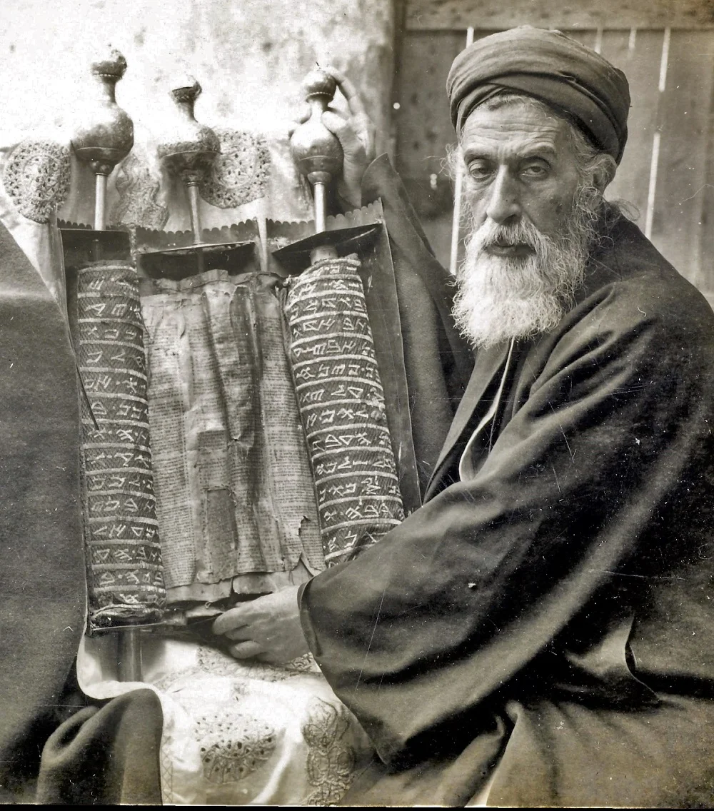 Yaakov ben Aharon, Samaritan High Priest (1896-1916), with a Samaritan Pentateuch | Part of a stereograph series from Views of Palestine (1905) | Image source