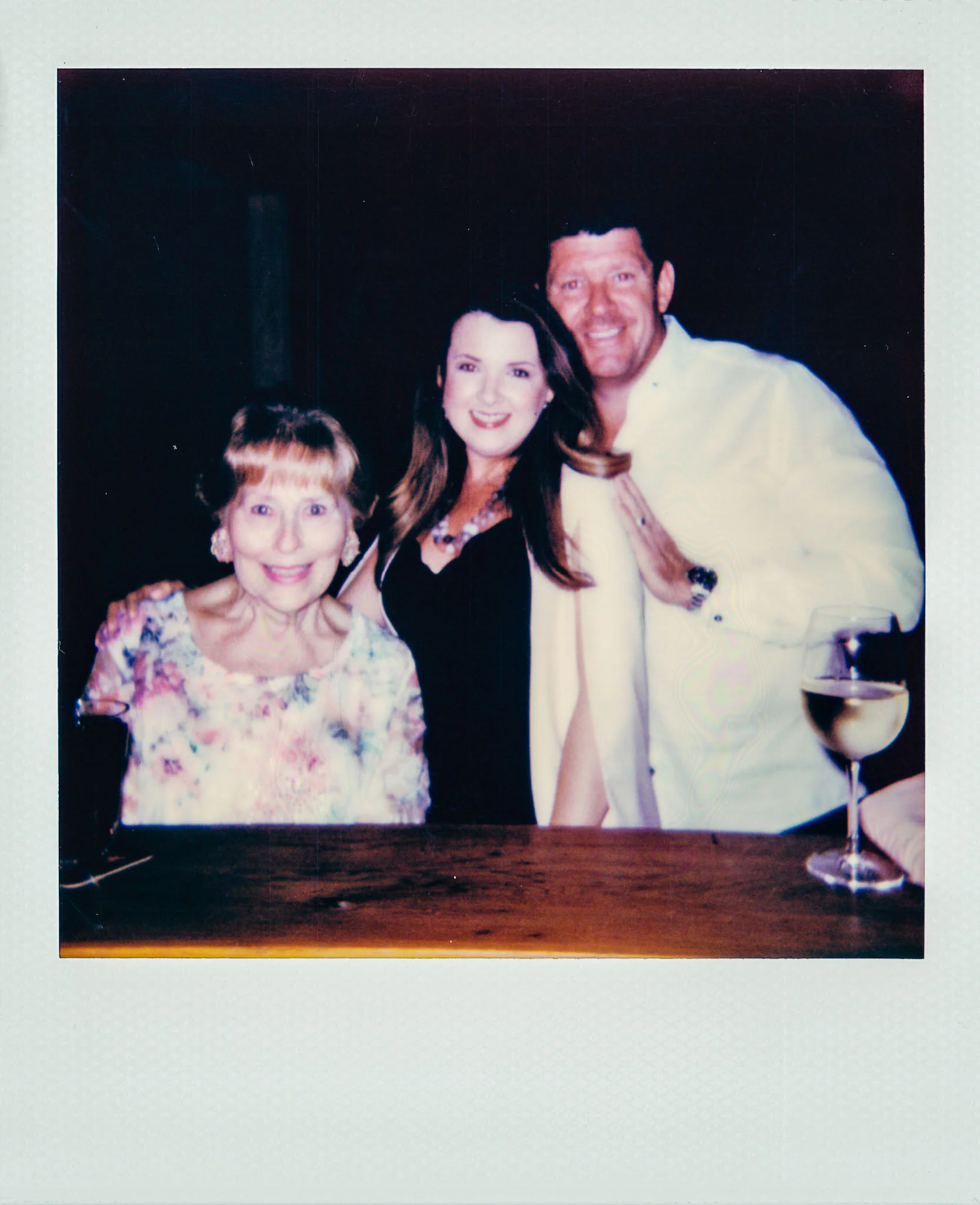 Linda Updike and Lauren Ferriola with a friend at Wallys Mills Avenue Liquors