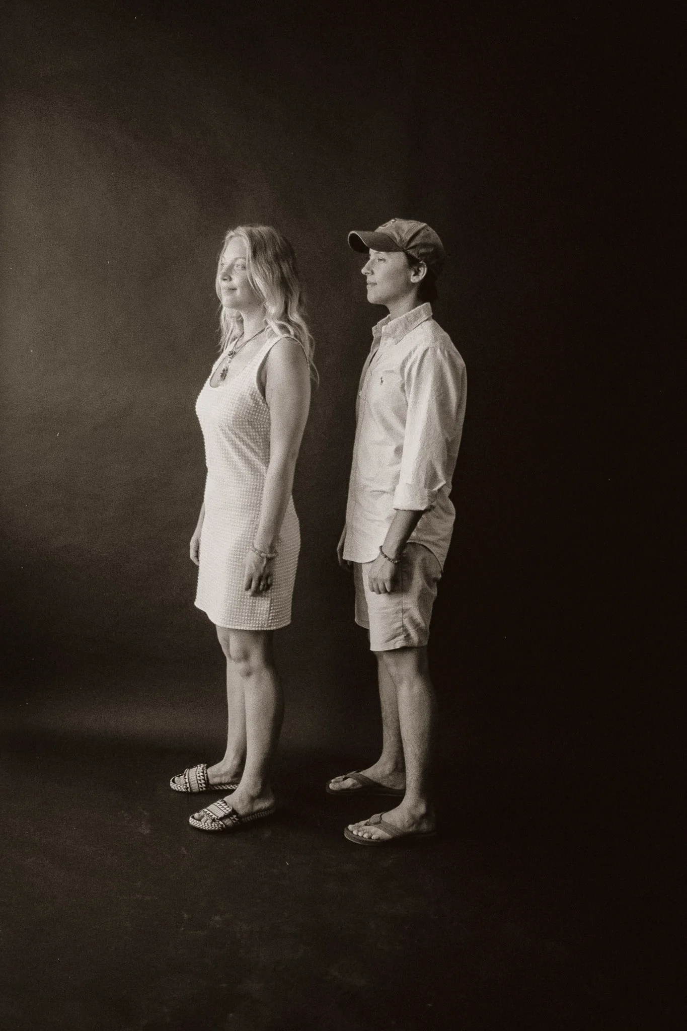 Guy and Girl standing side by side 