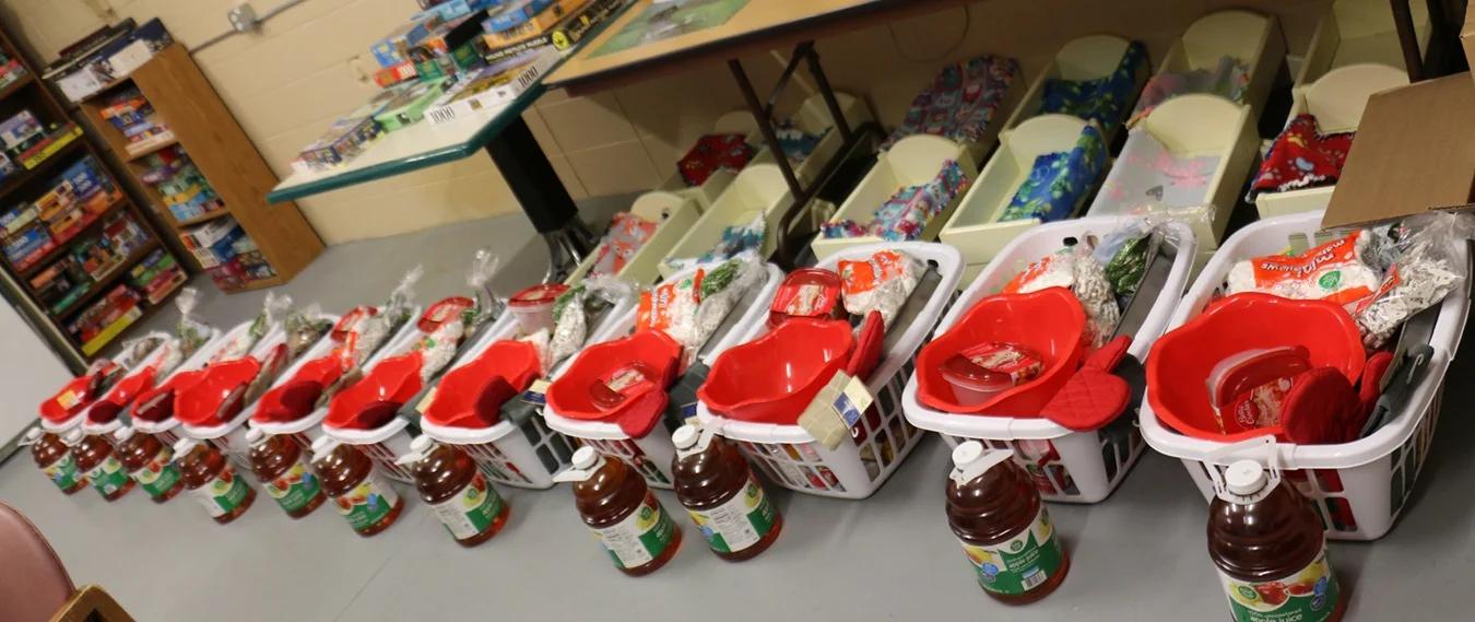 Each family received an overflowing basket of food for a Christmas dinner, thanks to the donation from Plenco.