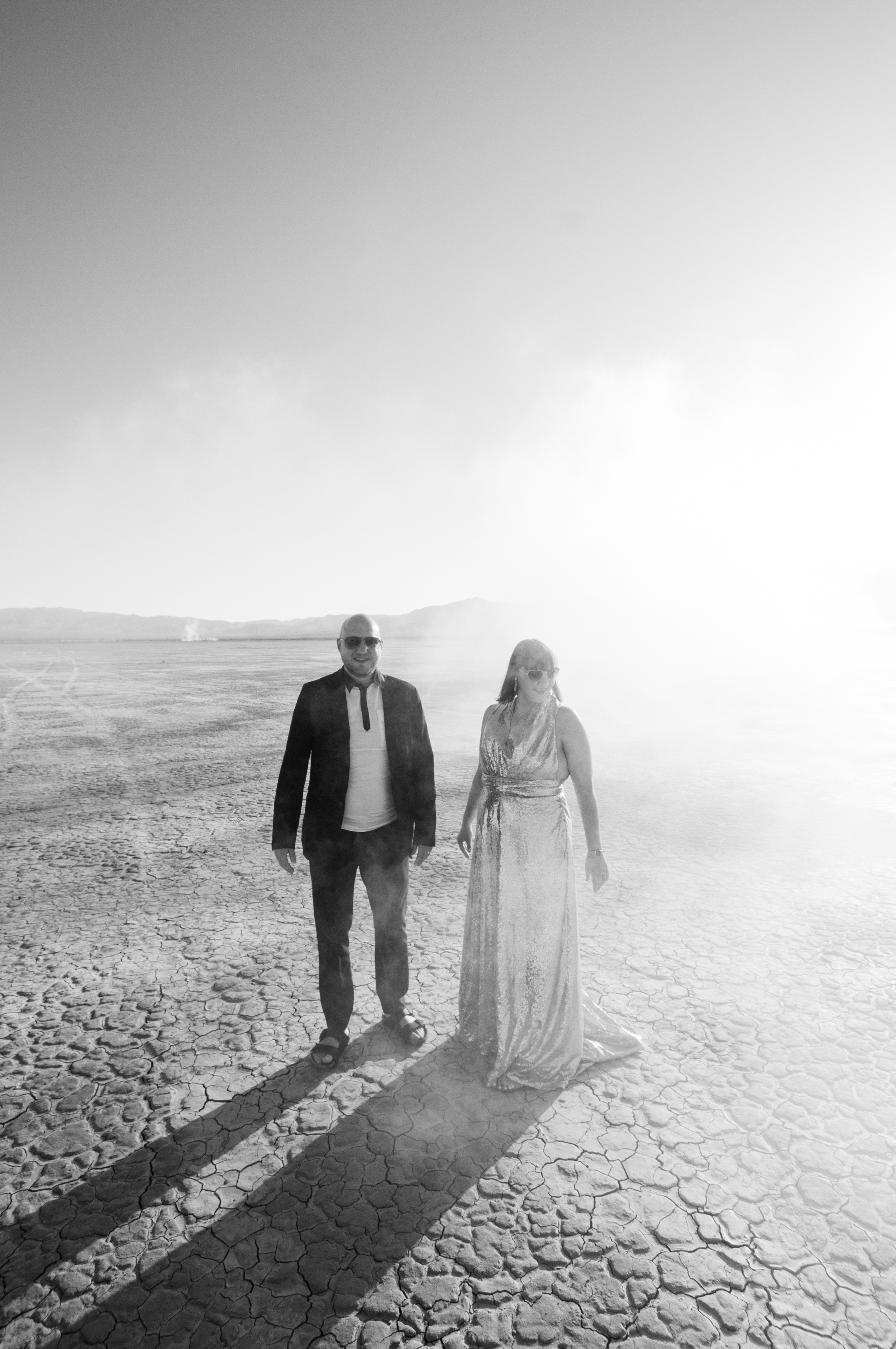 smoke bomb wedding, pop up wedding, elopement las vegas, las vegas elopement, smoke bomb elopement, elope in vegas, las vegas, dry lake bed, orange smoke bomb