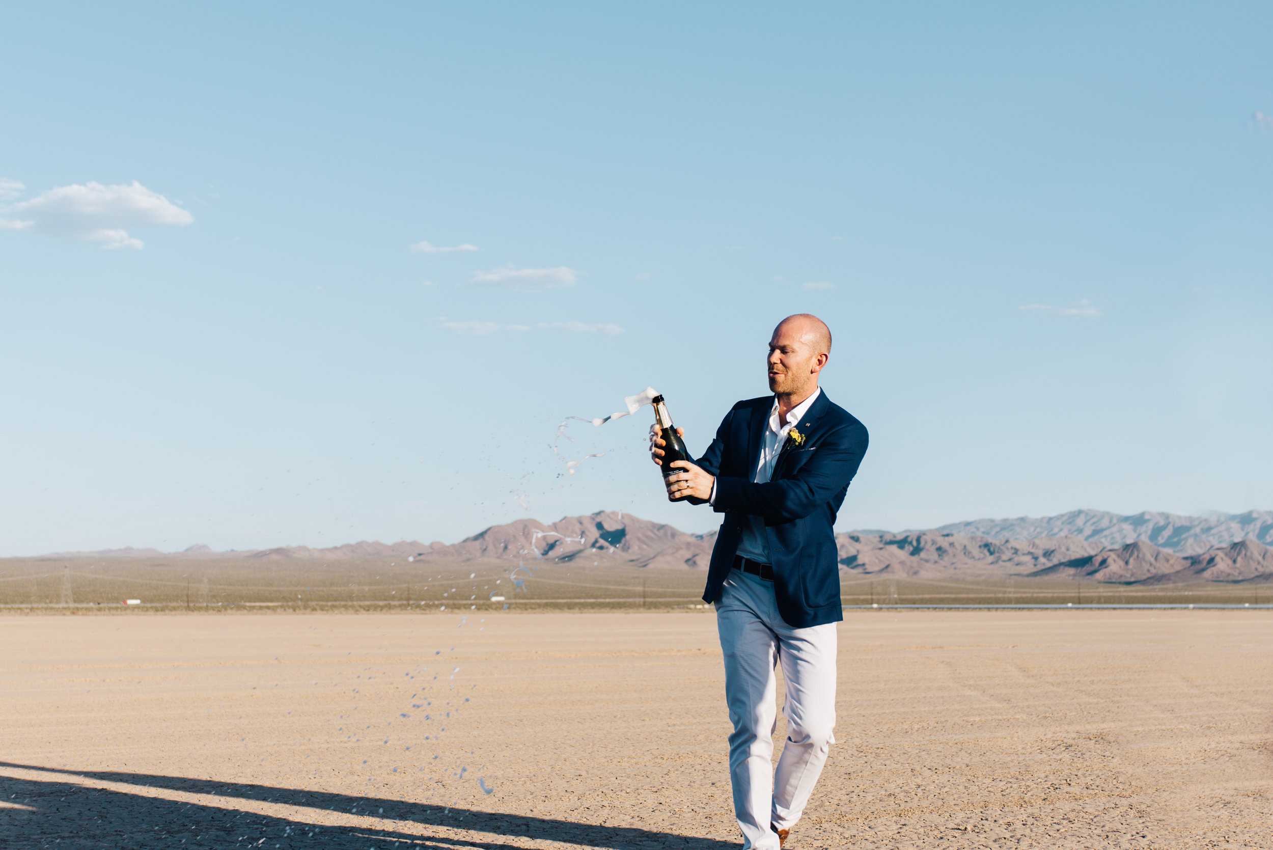 ted baker groom suit, groom, dry lake bed elopement, elopement, flora pop, las vegas wedding, las vegas elopement, pop up wedding, desert wedding, essence of australia wedding dress, wedding dress, bride, bride style, bridal, aussie wedding, las vegas photographer, desert life, summer wedding, 
