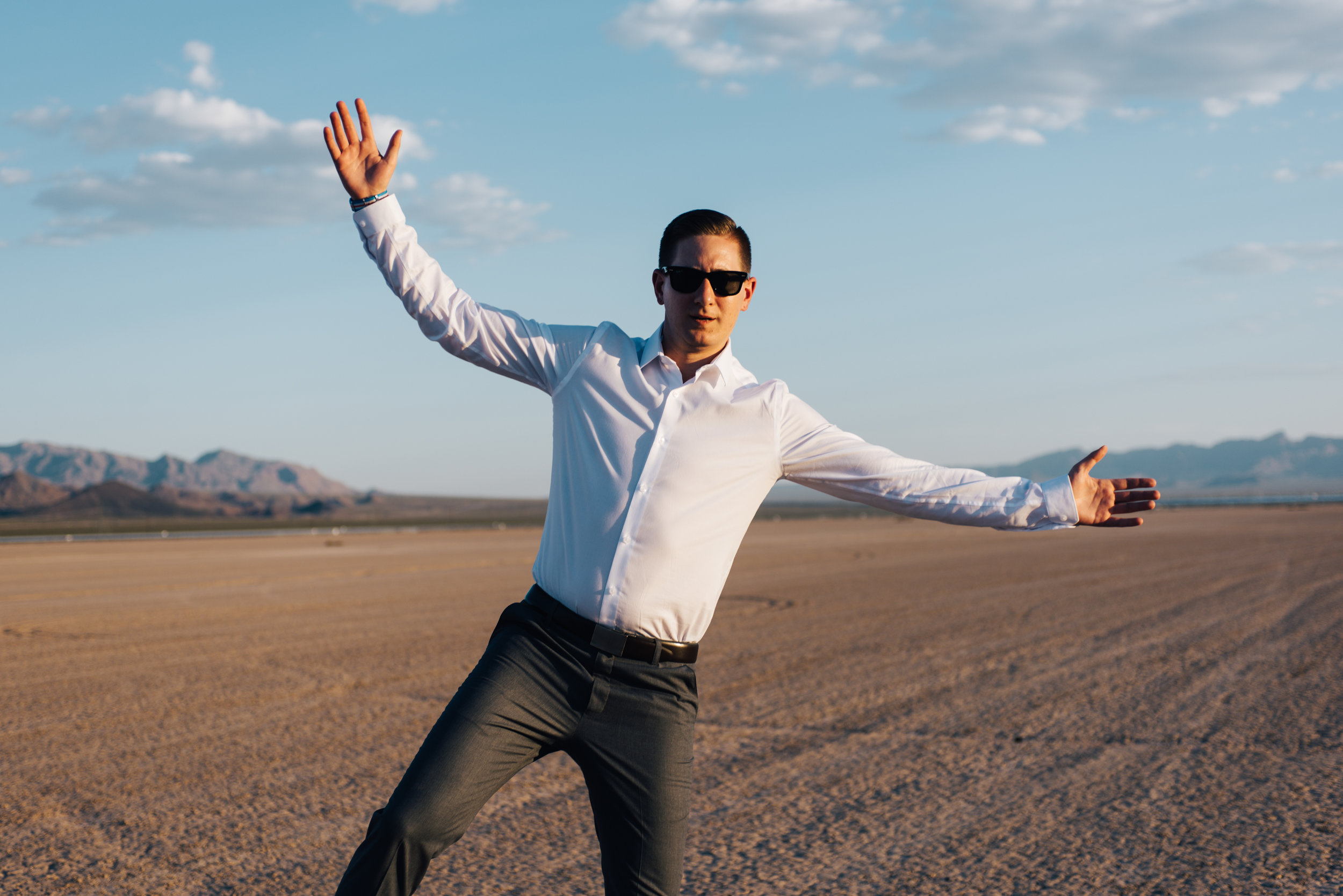 ted baker groom suit, groom, dry lake bed elopement, elopement, flora pop, las vegas wedding, las vegas elopement, pop up wedding, desert wedding, essence of australia wedding dress, wedding dress, bride, bride style, bridal, aussie wedding, las vegas photographer, desert life, summer wedding, blush, blush bridal party, girls, flower crown, 
