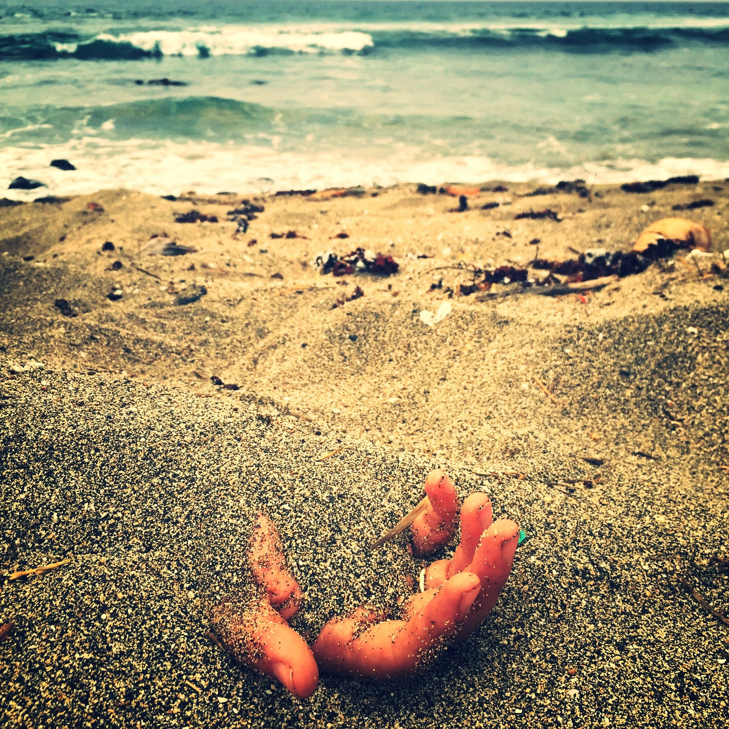    # deaddenah Buried at Sea , 2016  Old Airport Beach, Kailua-Kona 