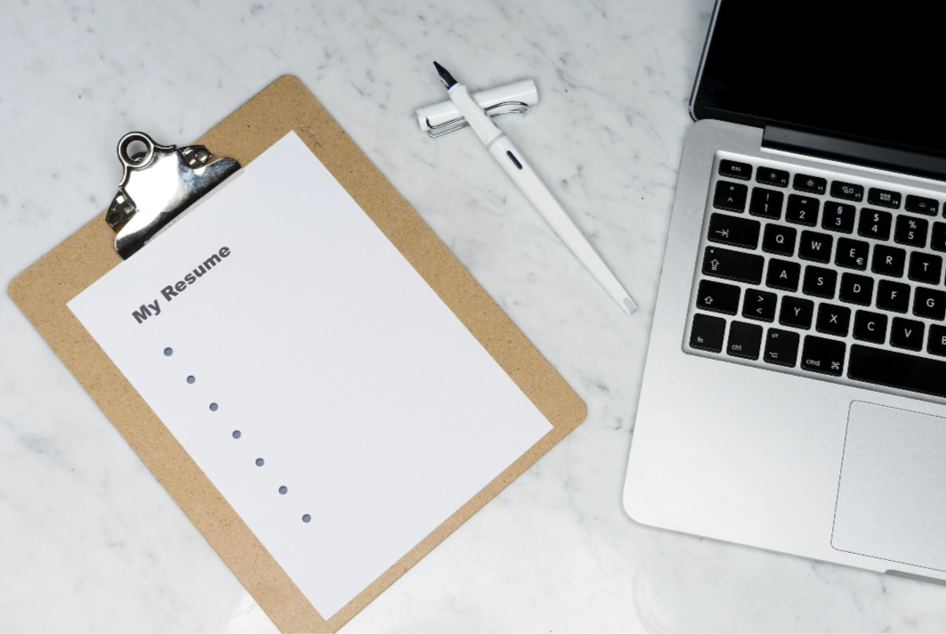 clipboard with paper that reads my resume.png