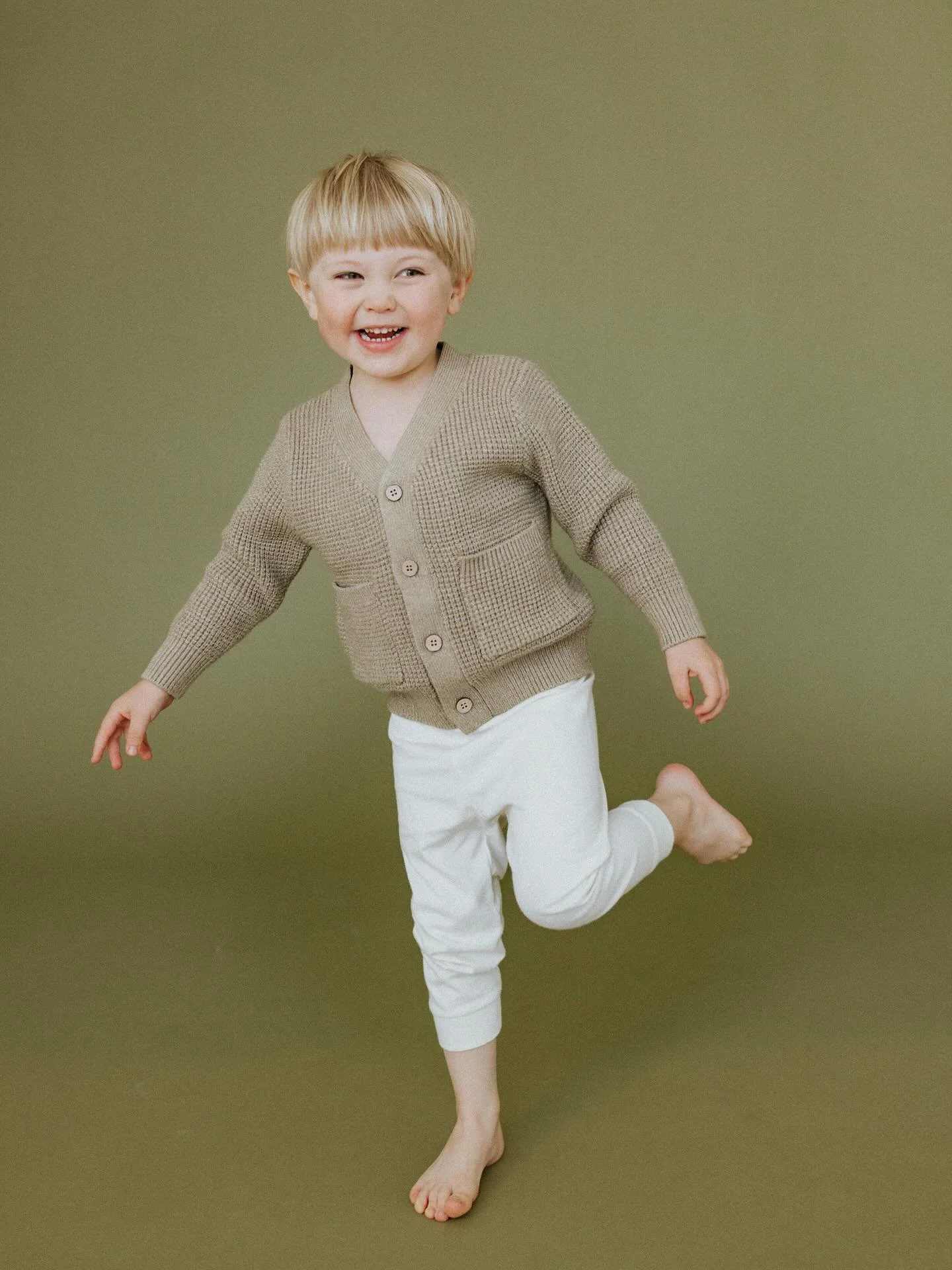 Jasper on one foot in the most darling @ryleeandcru sweater&mdash;accessorized with a stuffy in the ✌️nd slide 🐰! #ryleeandcru