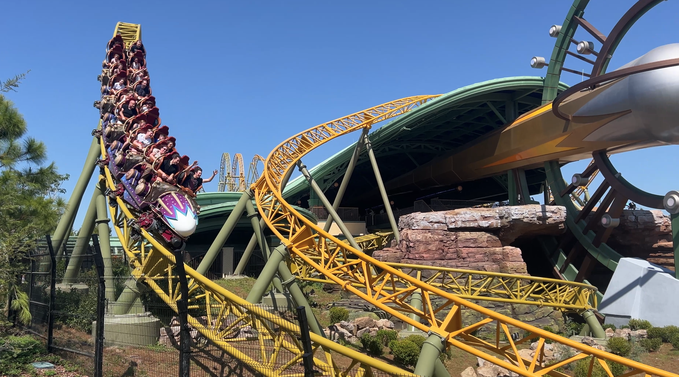 Stardust racers at epic universe roller coaster coming down a hill