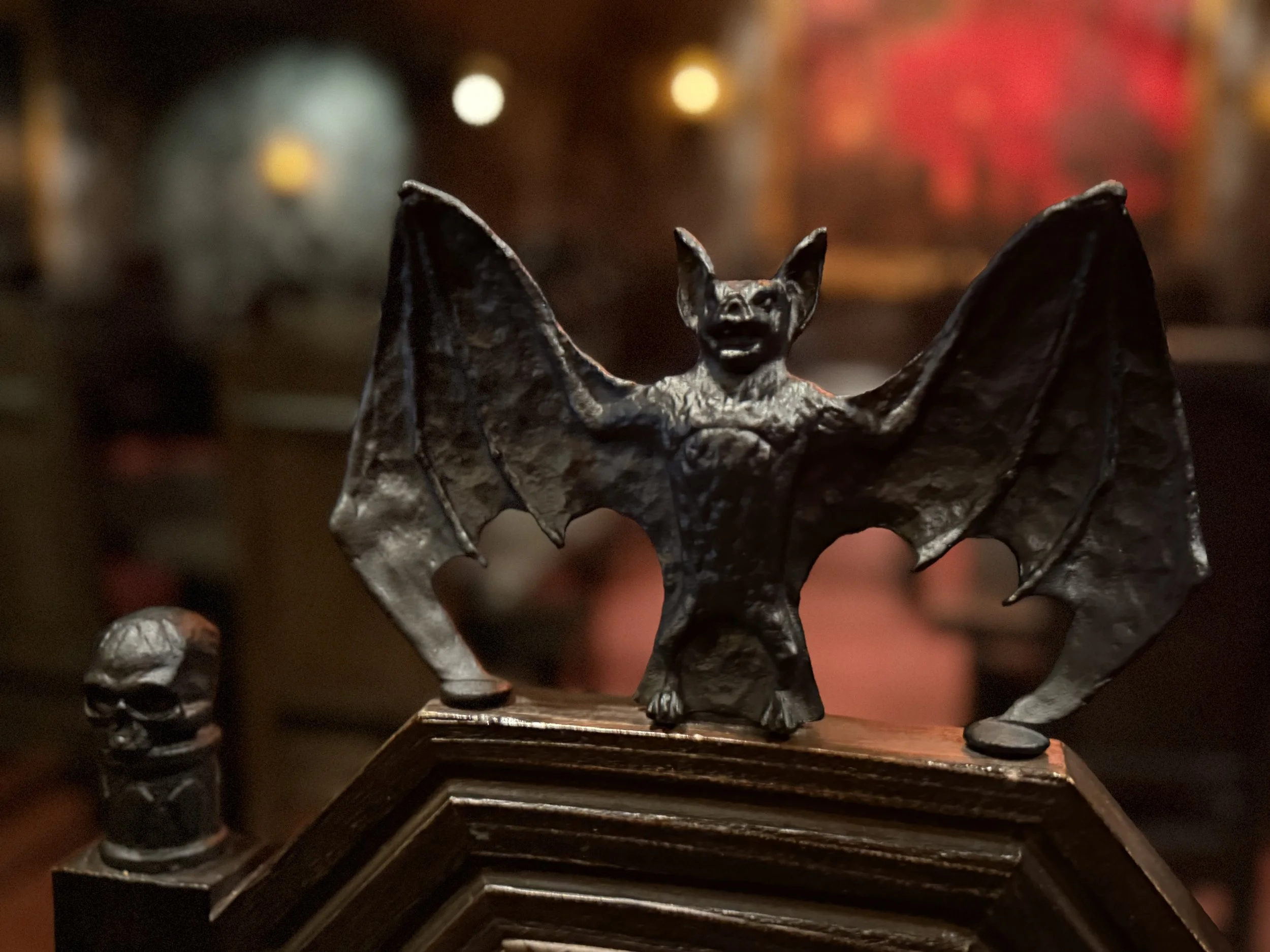 The back of the dining room chairs have bats on them at Das Steakhouse