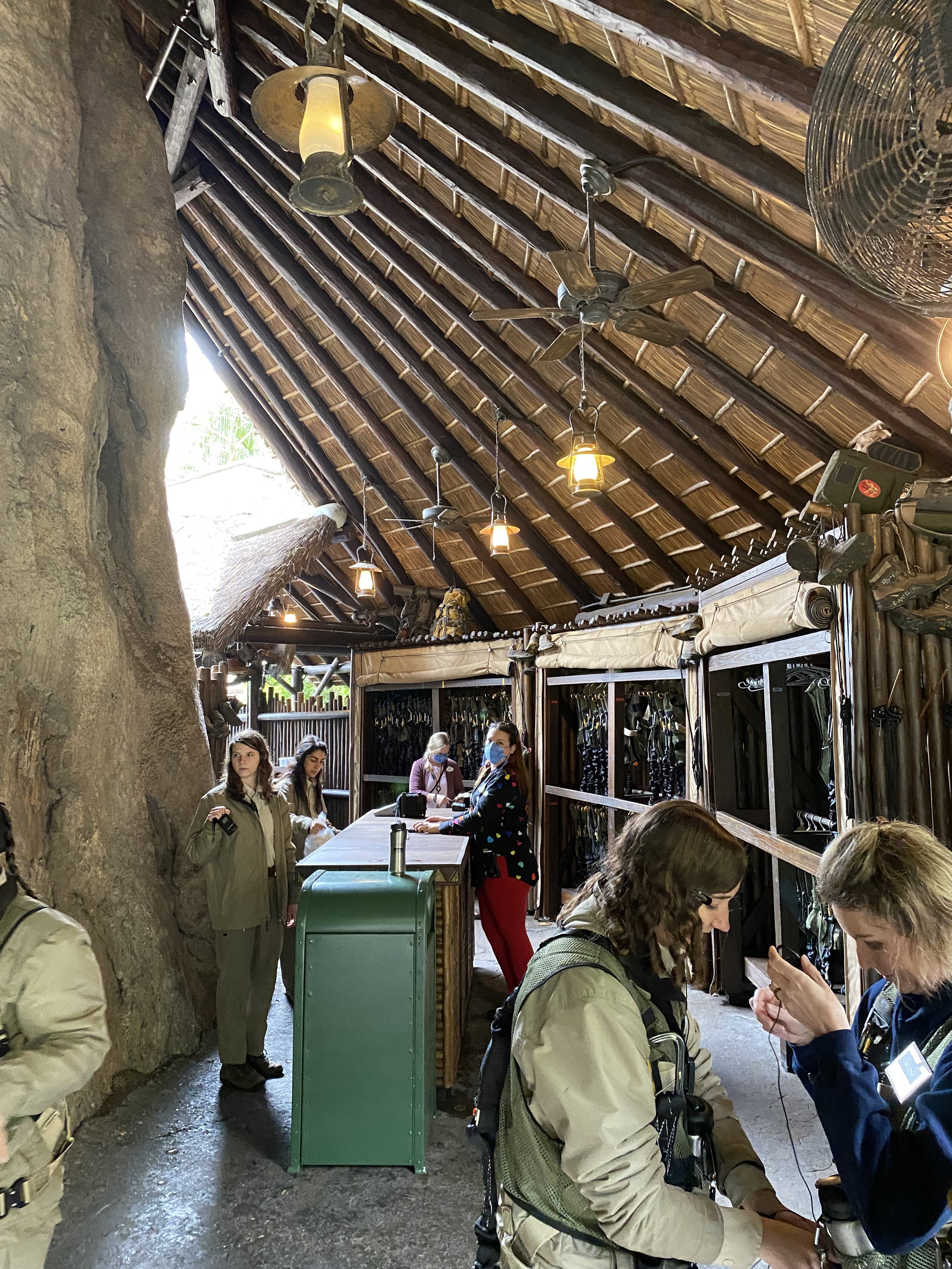  After checking in at the entrance to Kilimanjaro Safaris, we met our guides and the other members of group. There were about 10 of us in all.     Our guides reviewed some rules and assisted with the gear we needed for our trek.   We were given safar