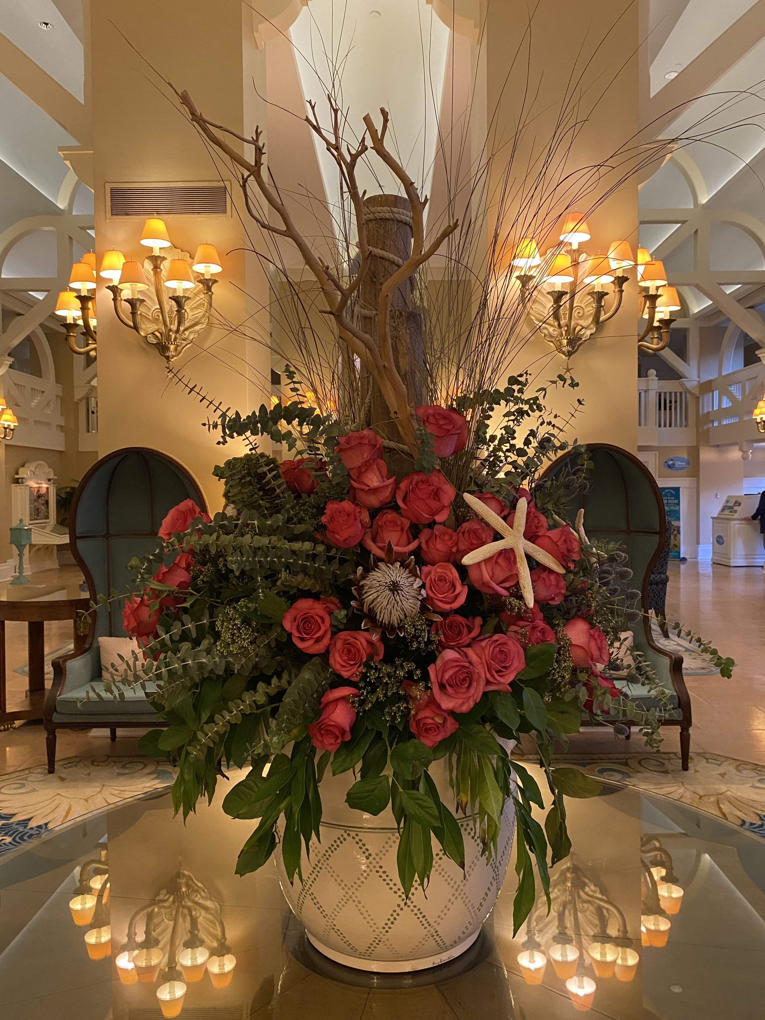  Yes, they’re real! This flower arrangements was deigned by the talented Cast Members of Disney World’s horticulture team. Each week the lobby gets a new arrangement, with an entierly new look.  