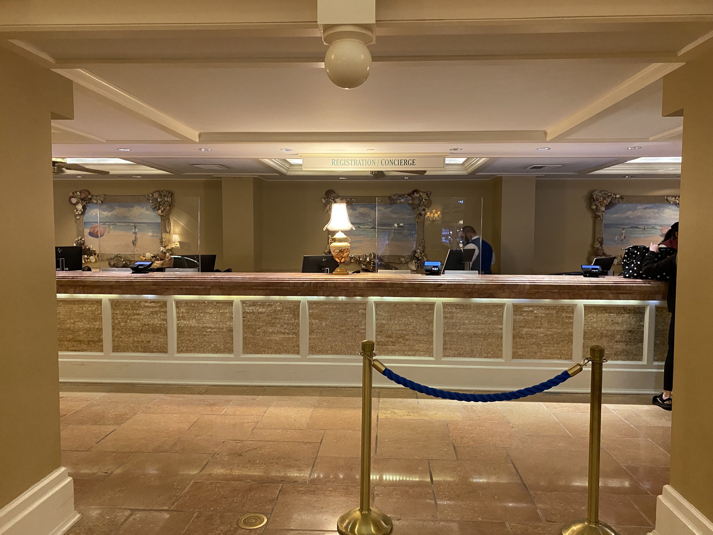  Most people are using Online Check In these days but you can still check in with a Cast Member if you prefer.     You’ll also find the lobby concierge desk here where a Cast Member will help you plan your itinerary and answer any questions you may h